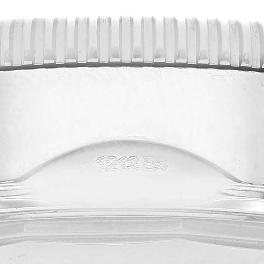 The image shows a close-up of the case back and part of the bezel of the Breitling Superocean A23370 Men
s Stainless Steel Silver Dial A23370 Men
s Stainless Steel Silver Dial model.