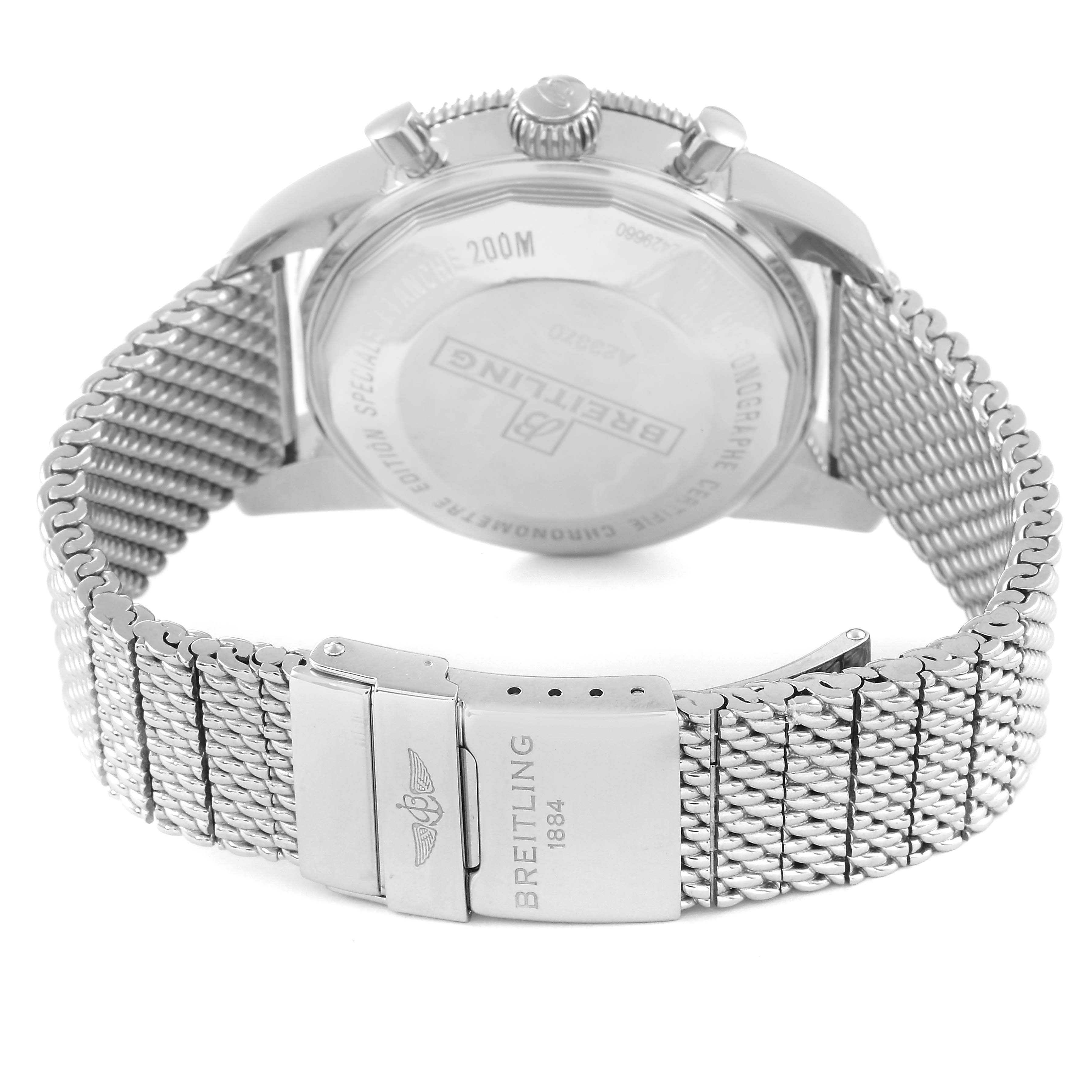 The image shows the back view of a Breitling Superocean A23370 Men
s Stainless Steel Silver Dial A23370 Men
s Stainless Steel Silver Dial watch and its metal mesh strap.