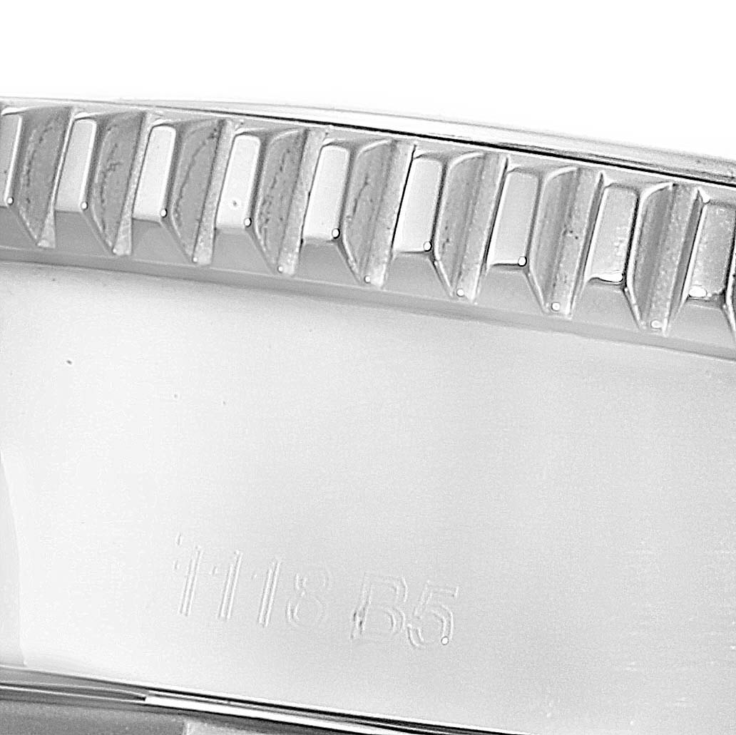 The image shows a close-up of the edge and grooved bezel of a Breitling Superocean A17365 Men's Stainless Steel Black Dial A17365 Men's Stainless Steel Black Dial watch.