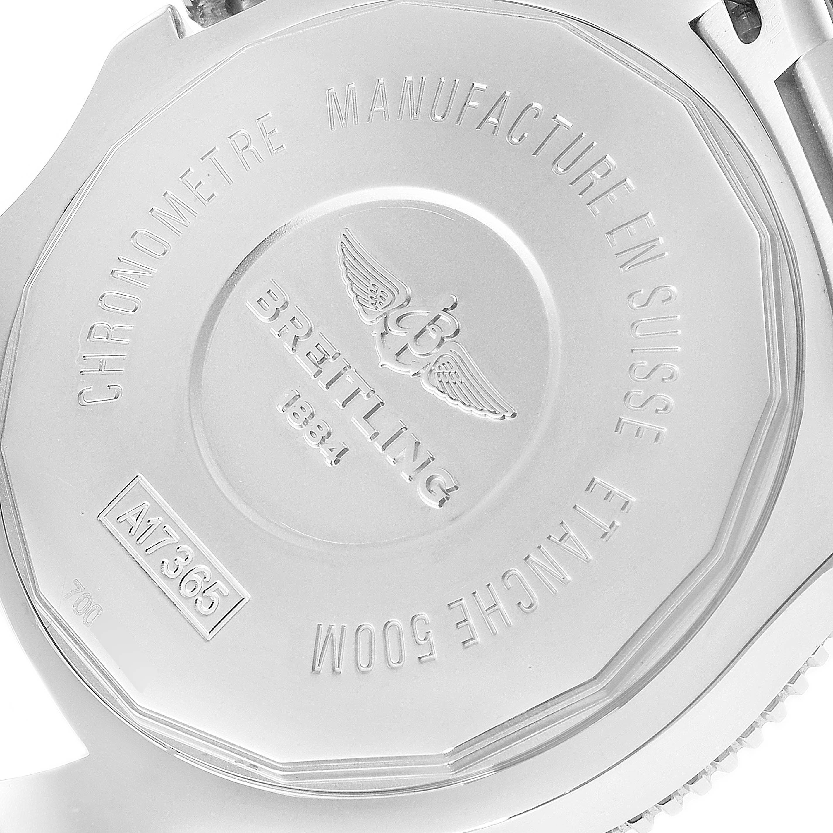 The image shows the back case of a Breitling Superocean A17365 Men's Stainless Steel Black Dial A17365 Men's Stainless Steel Black Dial watch, displaying its inscriptions and engravings.