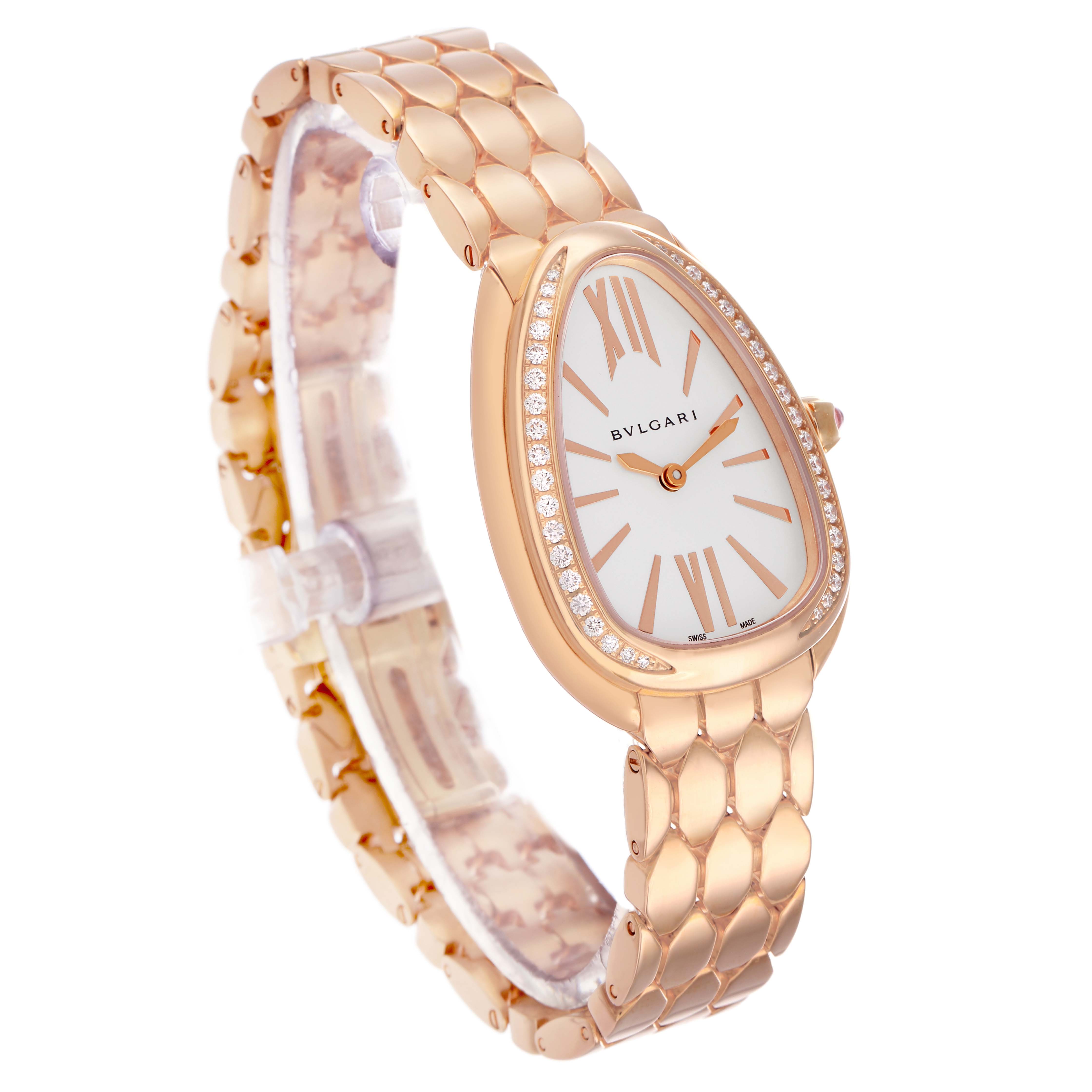 The Bvlgari 103145 Women's Rose Gold Silver Dial Serpenti Seduttori Rose Gold Diamond Ladies Watch 103145 is shown at a three-quarter angle, displaying its face, bracelet, and diamond-set bezel.