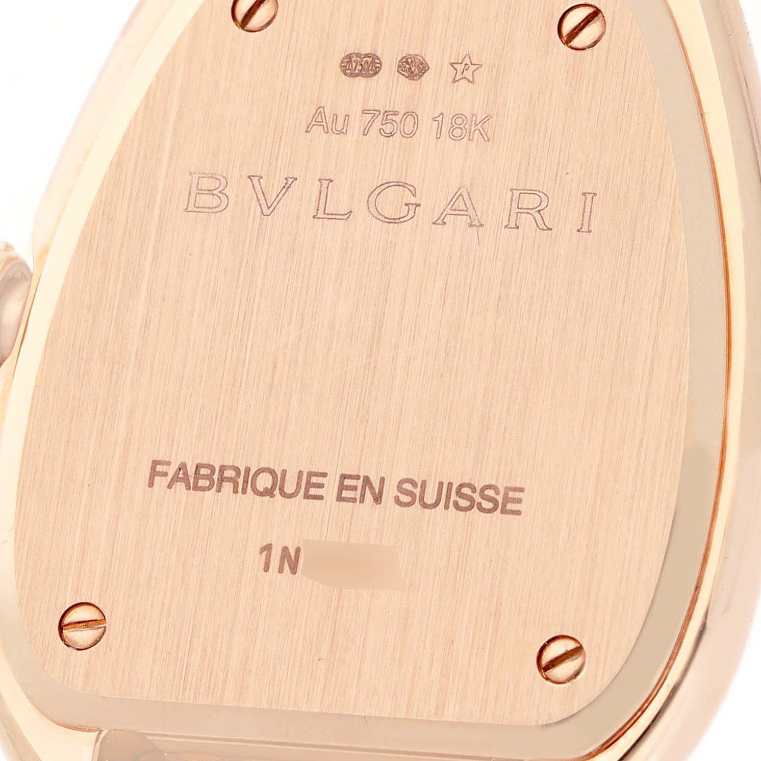 The image shows a close-up of the case back of the Bvlgari 103145 Women's Rose Gold Silver Dial Serpenti Seduttori Rose Gold Diamond Ladies Watch, model 103145.