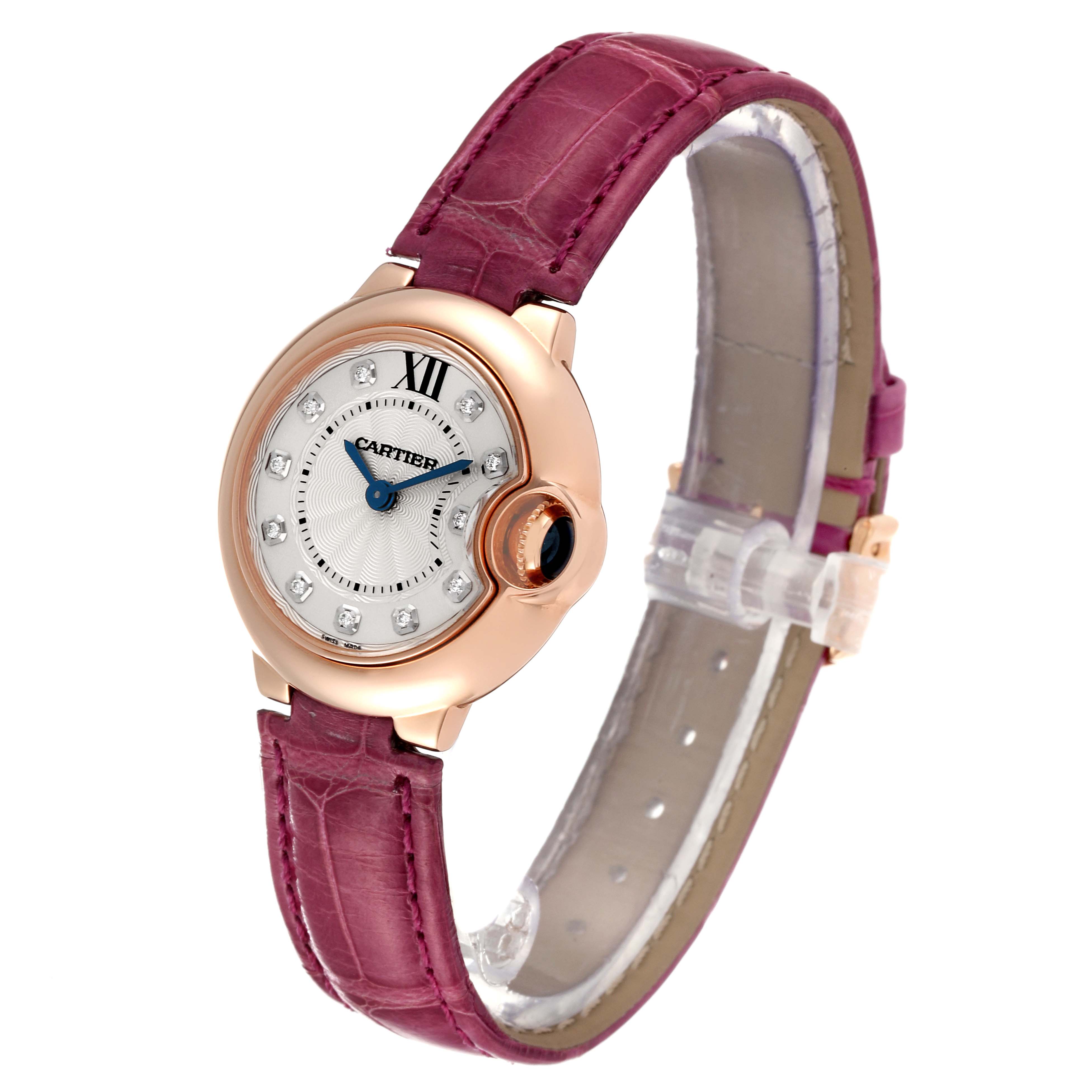 This image shows a Cartier Ballon Bleu WE902050 Women
s Rose Gold Silver Dial WE902050 Women
s Rose Gold Silver Dial watch at a three-quarter angle, highlighting its face, bezel, and strap.