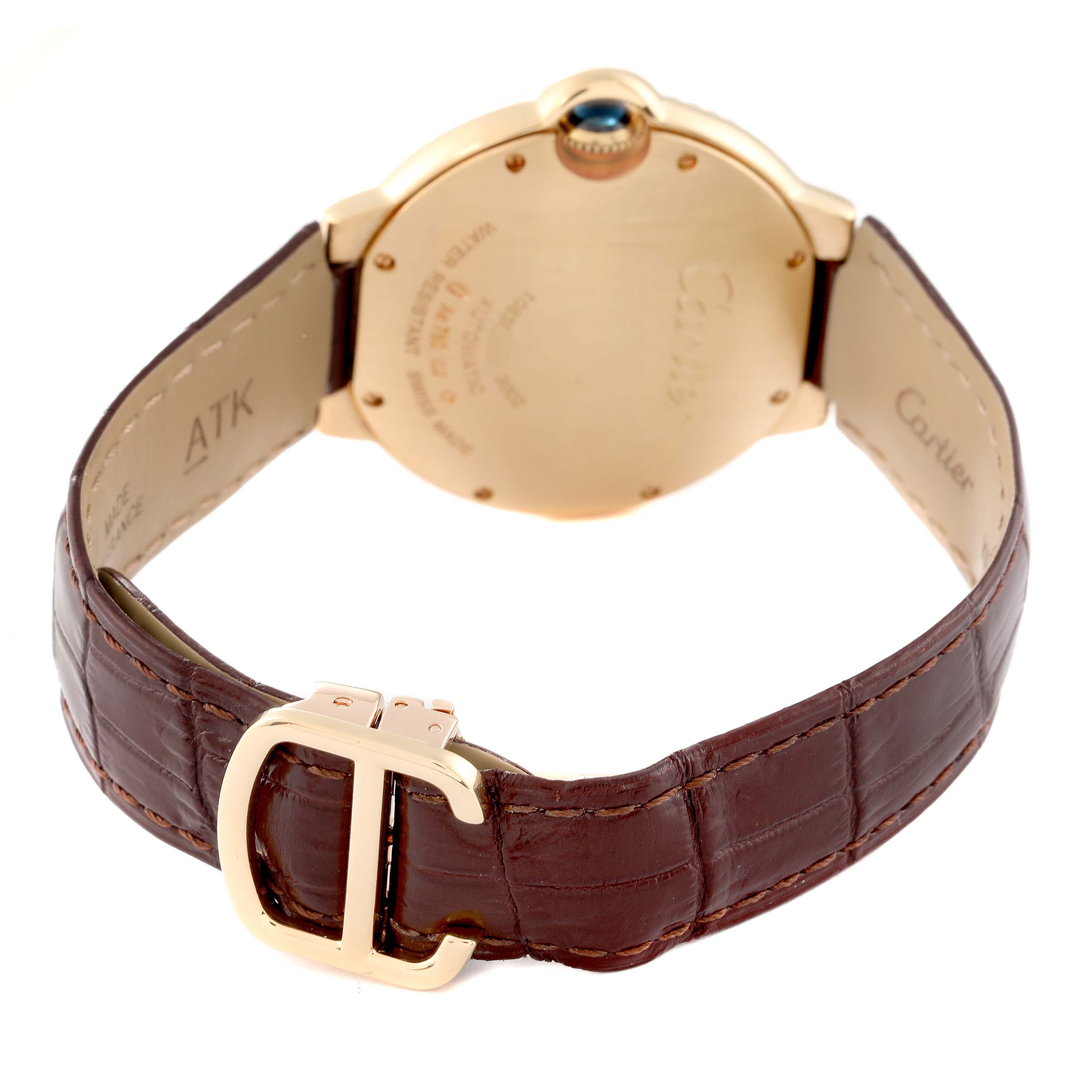 This image shows the back case and leather strap with buckle of a Cartier Ballon Bleu WE900451 Men's Yellow Gold Silver Dial WE900451 Men's Yellow Gold Silver Dial watch.