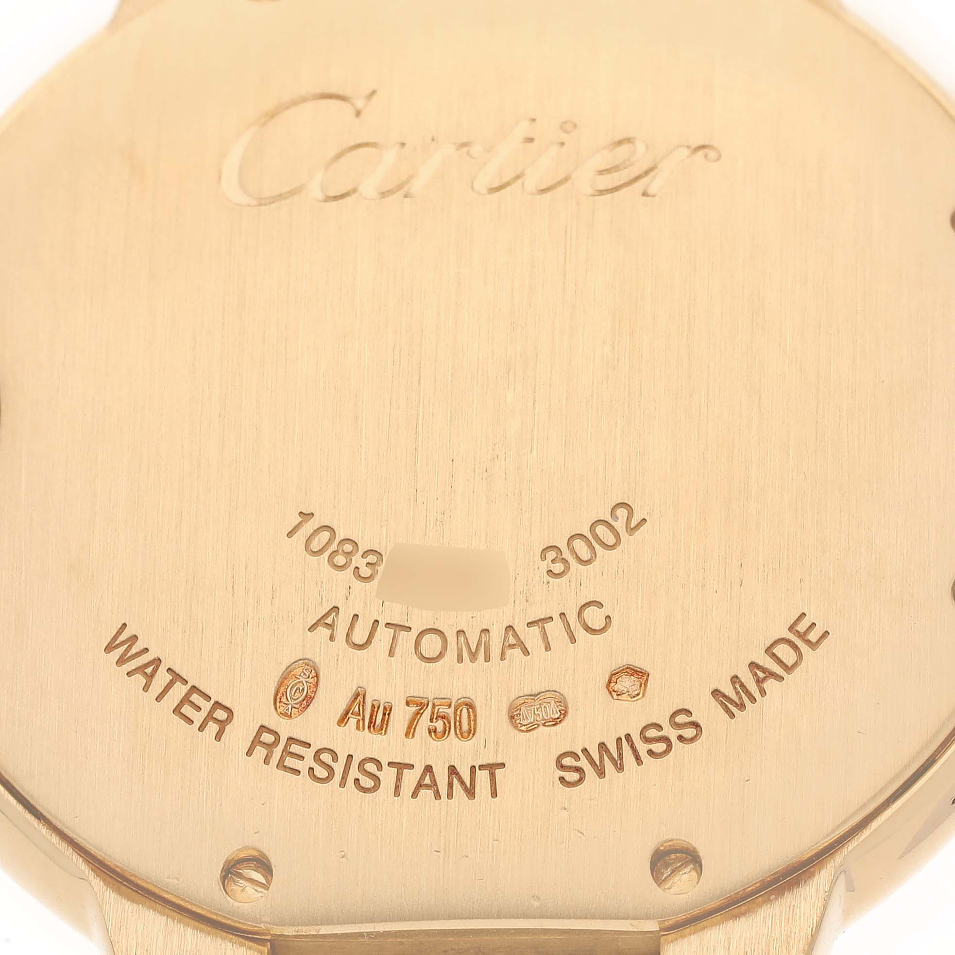 This image shows the back of a Cartier Ballon Bleu WE900451 Men's Yellow Gold Silver Dial WE900451 Men's Yellow Gold Silver Dial watch, highlighting the brand name, model, and details like "Automatic" and "Swiss Made."