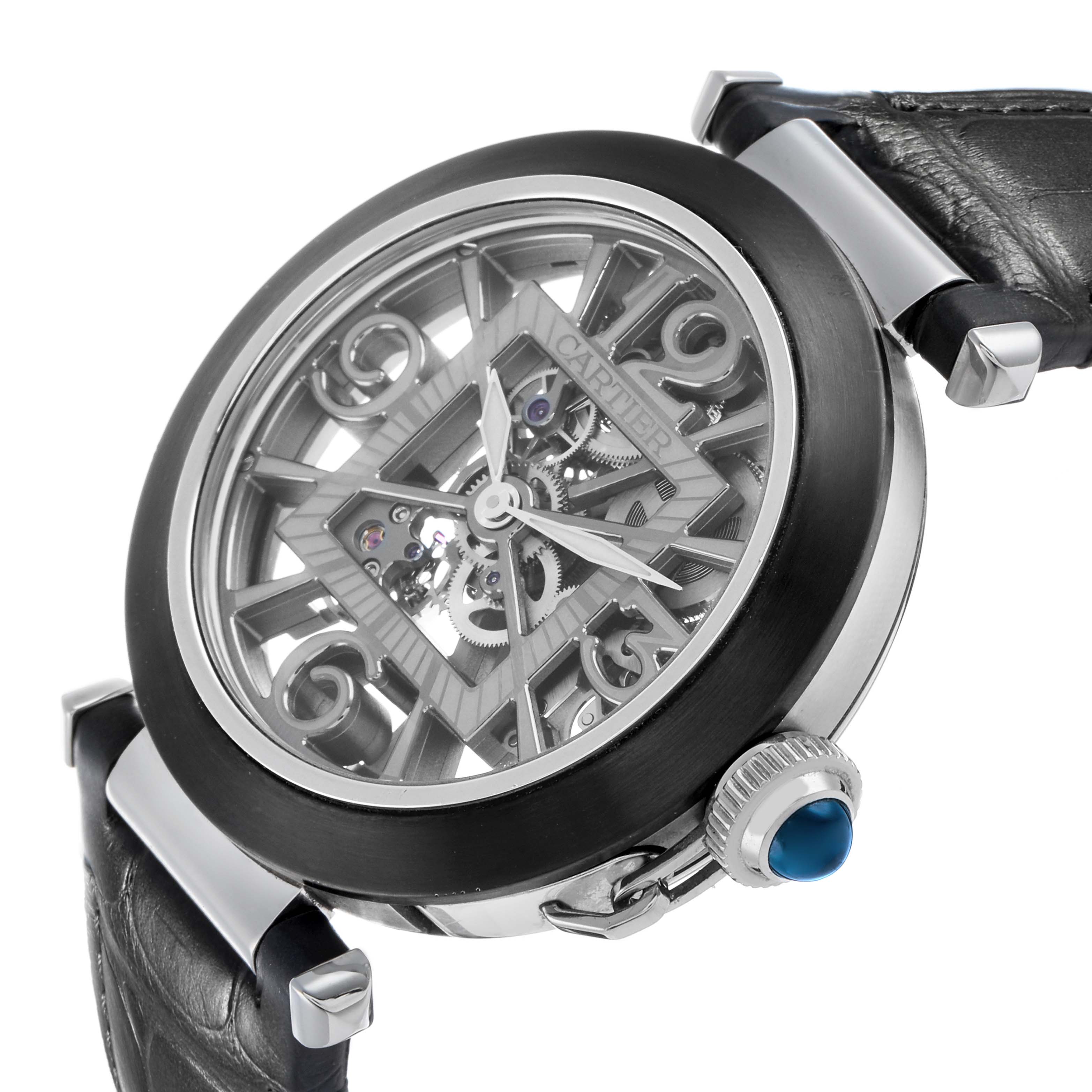 The Cartier Pasha WHPA0017 Men's Stainless Steel Transparent Dial watch is shown at a three-quarter angle, highlighting the case, skeleton dial, crown, and part of the strap.
