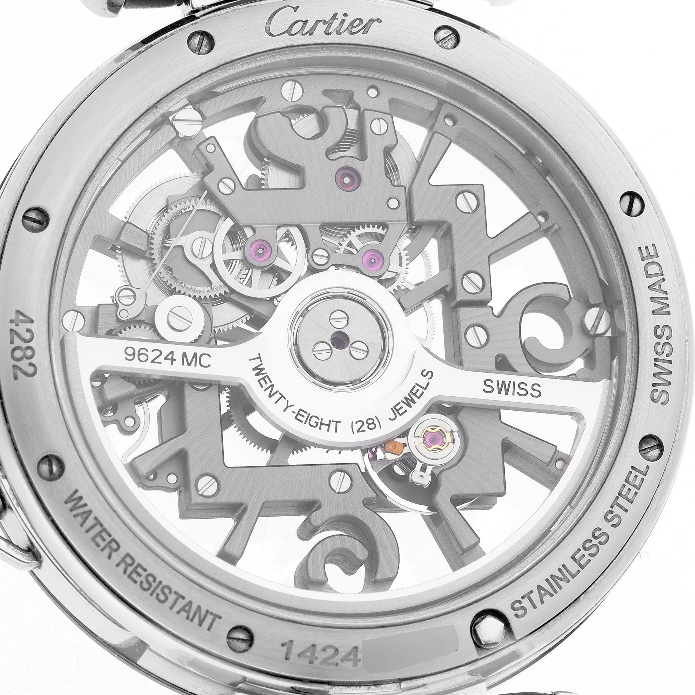 The Cartier Pasha WHPA0017 Men's Stainless Steel Transparent Dial watch is shown from the back, displaying its intricate movement and components.