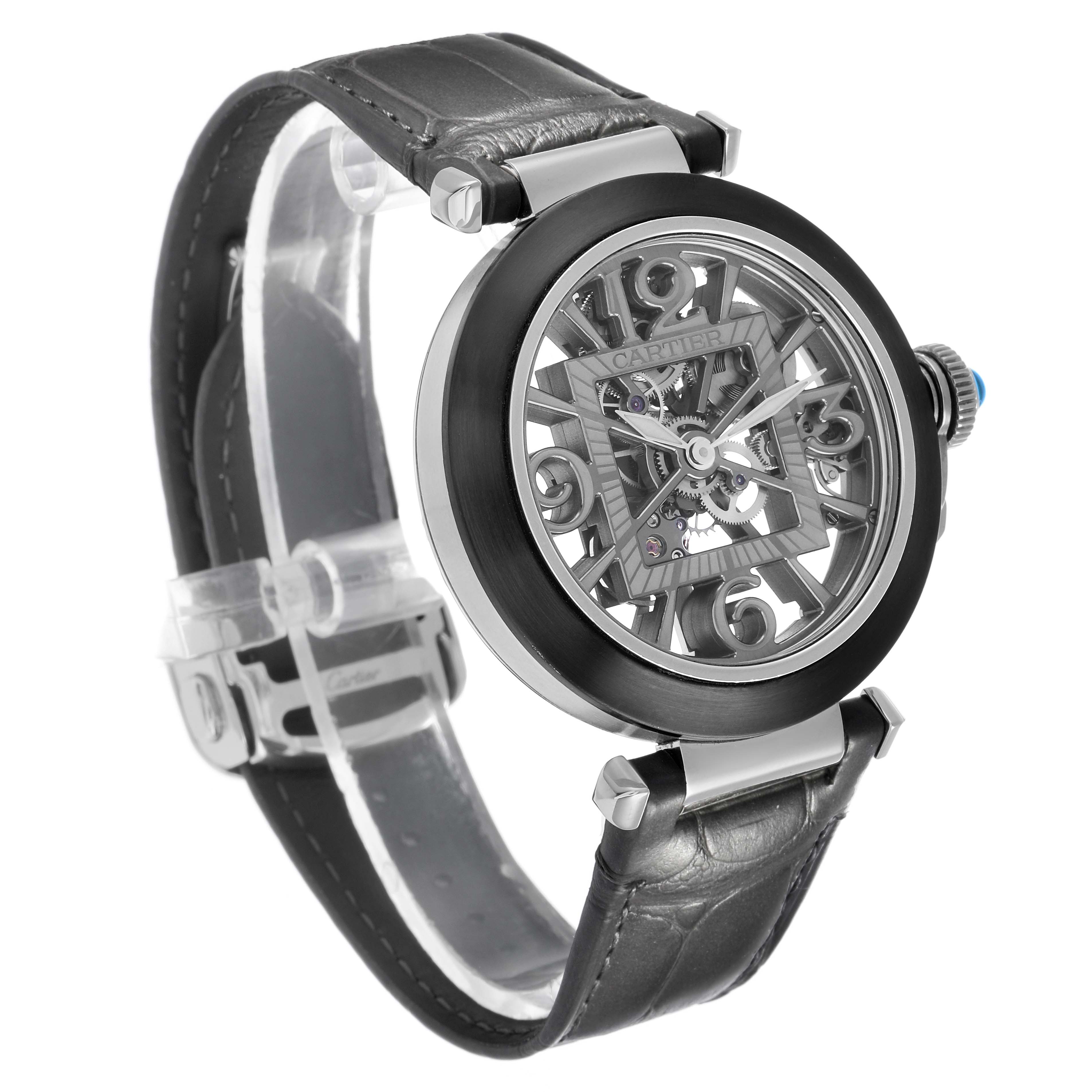 The Cartier Pasha WHPA0017 Men's Stainless Steel Transparent Dial watch is shown at a three-quarter angle, highlighting the skeletonized dial, leather strap, and prominent crown.