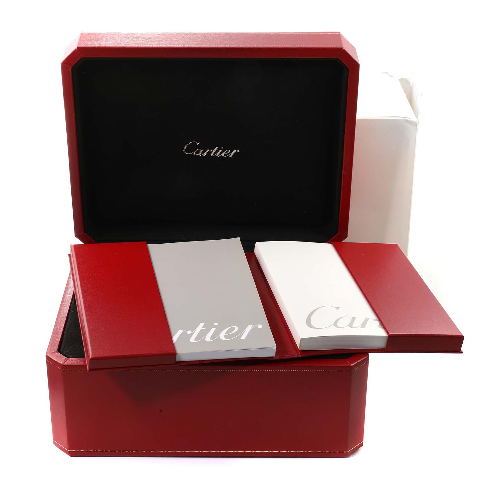 The image shows the packaging of a Cartier Roadster W62004V3 Men's Stainless Steel Black Dial W62004V3 Men's Stainless Steel Black Dial watch, including a red box and accompanying booklets.