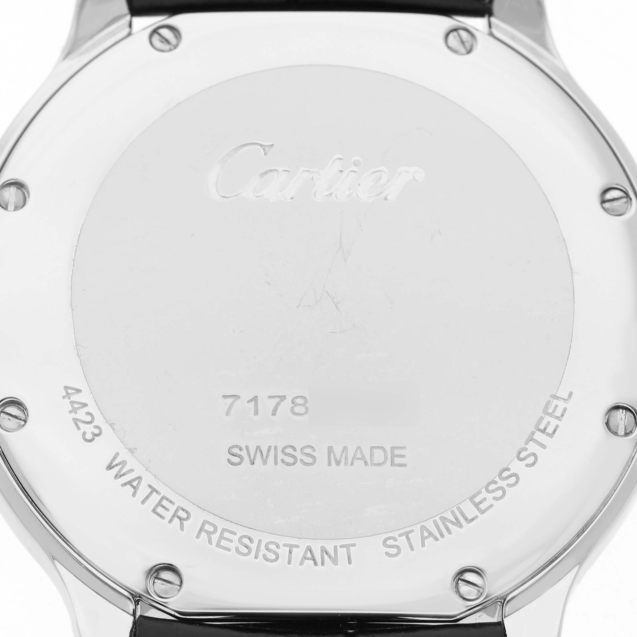 The image shows the back case of the Cartier Ronde WSRN0031 Men's Stainless Steel Silver Dial watch, displaying engravings and screws.