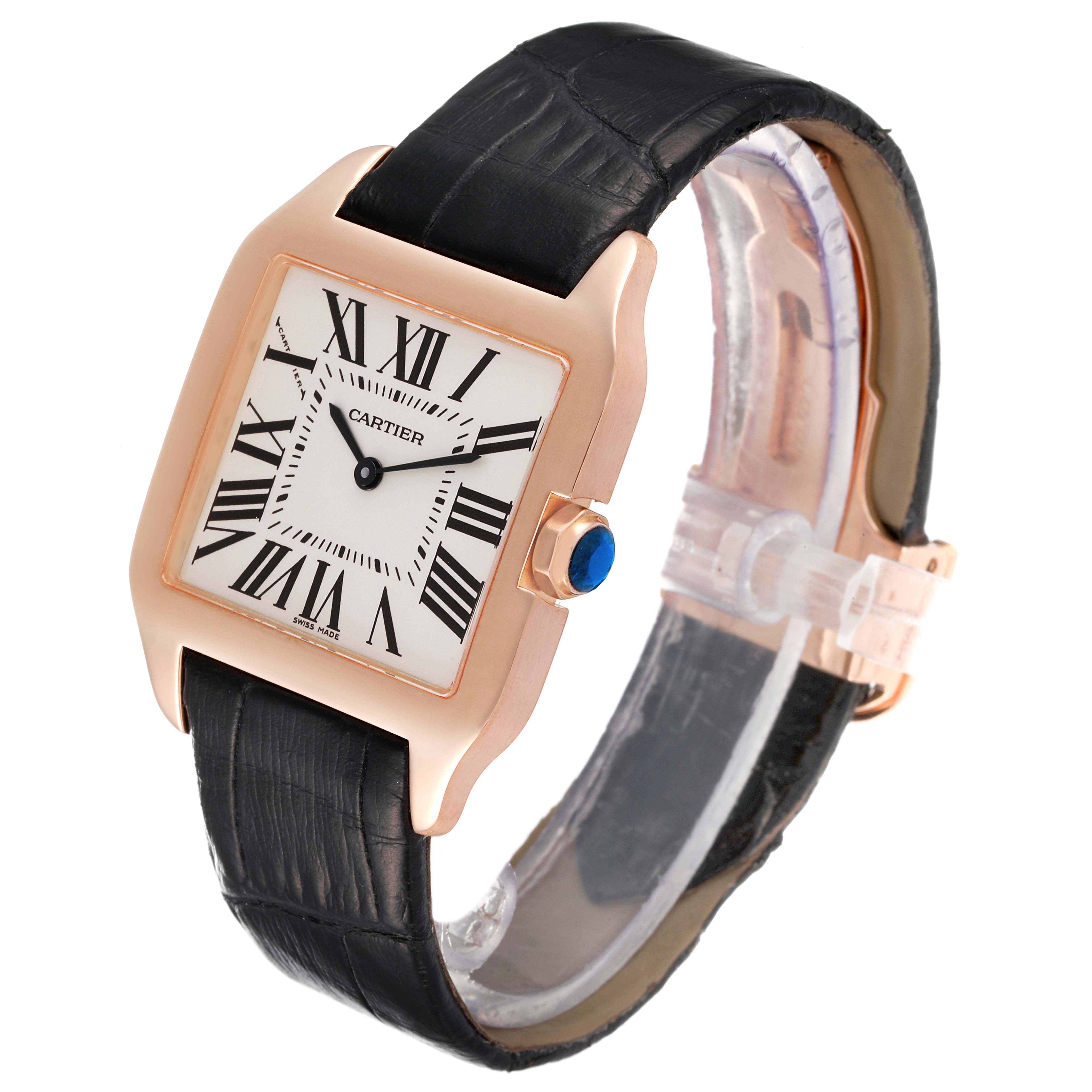 The Cartier Santos Dumont W2009251 Men's Rose Gold Silver Dial W2009251 Men's Rose Gold Silver Dial watch is shown from a front angle, highlighting the face, Roman numerals, and the black leather strap.