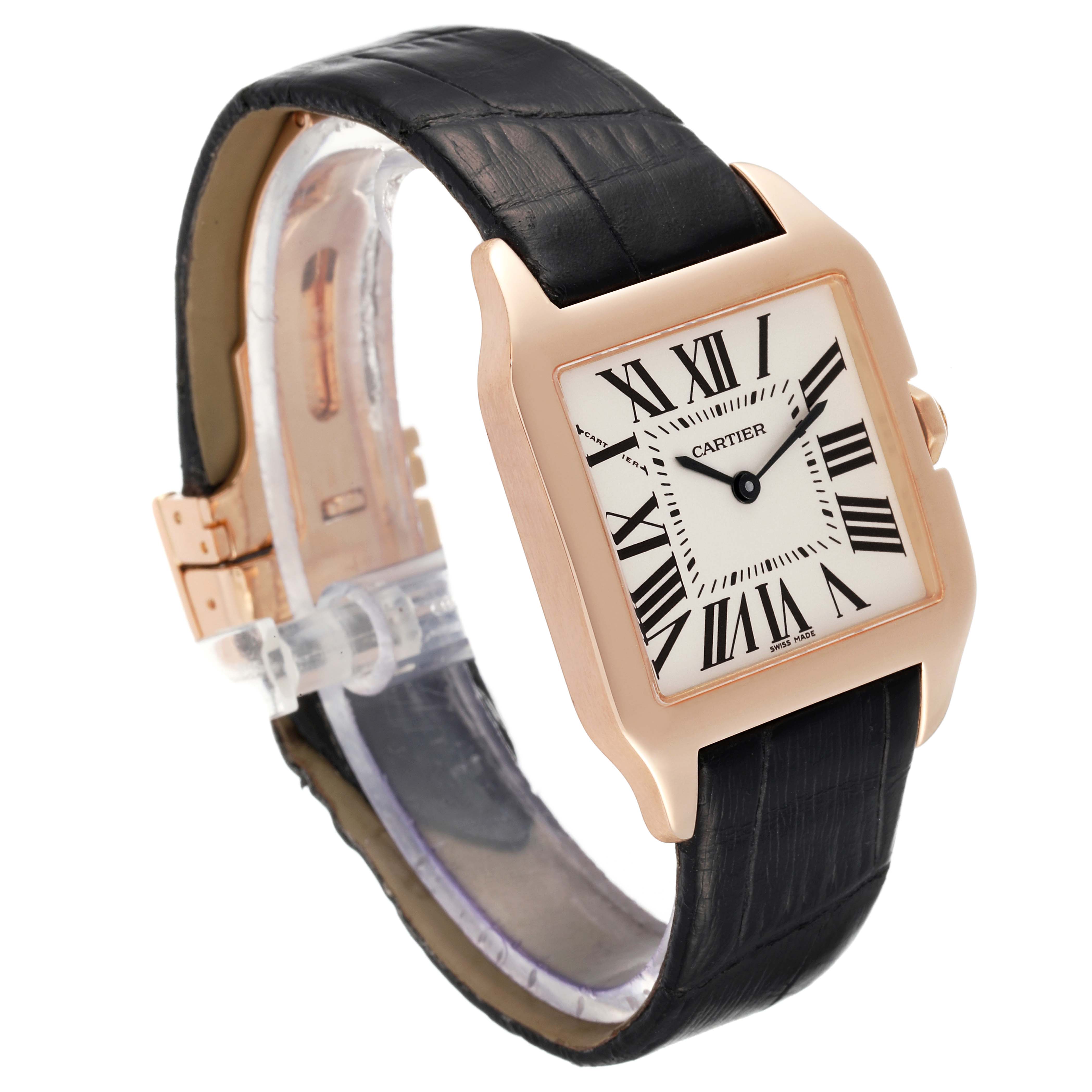 This Cartier Santos Dumont W2009251 Men's Rose Gold Silver Dial W2009251 Men's Rose Gold Silver Dial watch is shown at a slight angle, displaying its face, Roman numeral markers, case, and leather strap.