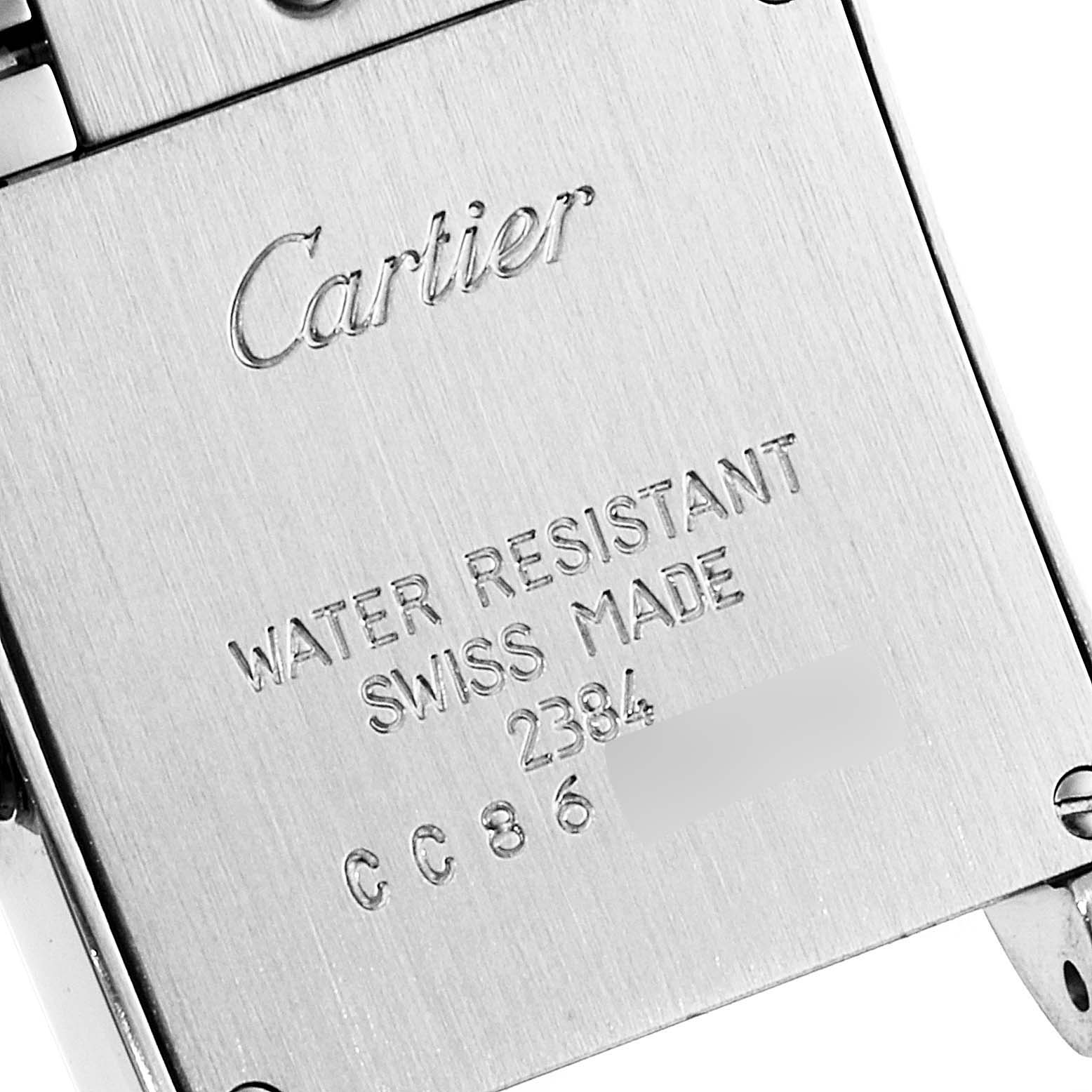 This image shows the back case of a Cartier Tank Francaise W51008Q3 Women's Stainless Steel Silver Dial W51008Q3 Women's Stainless Steel Silver Dial watch with model information and branding engraved.