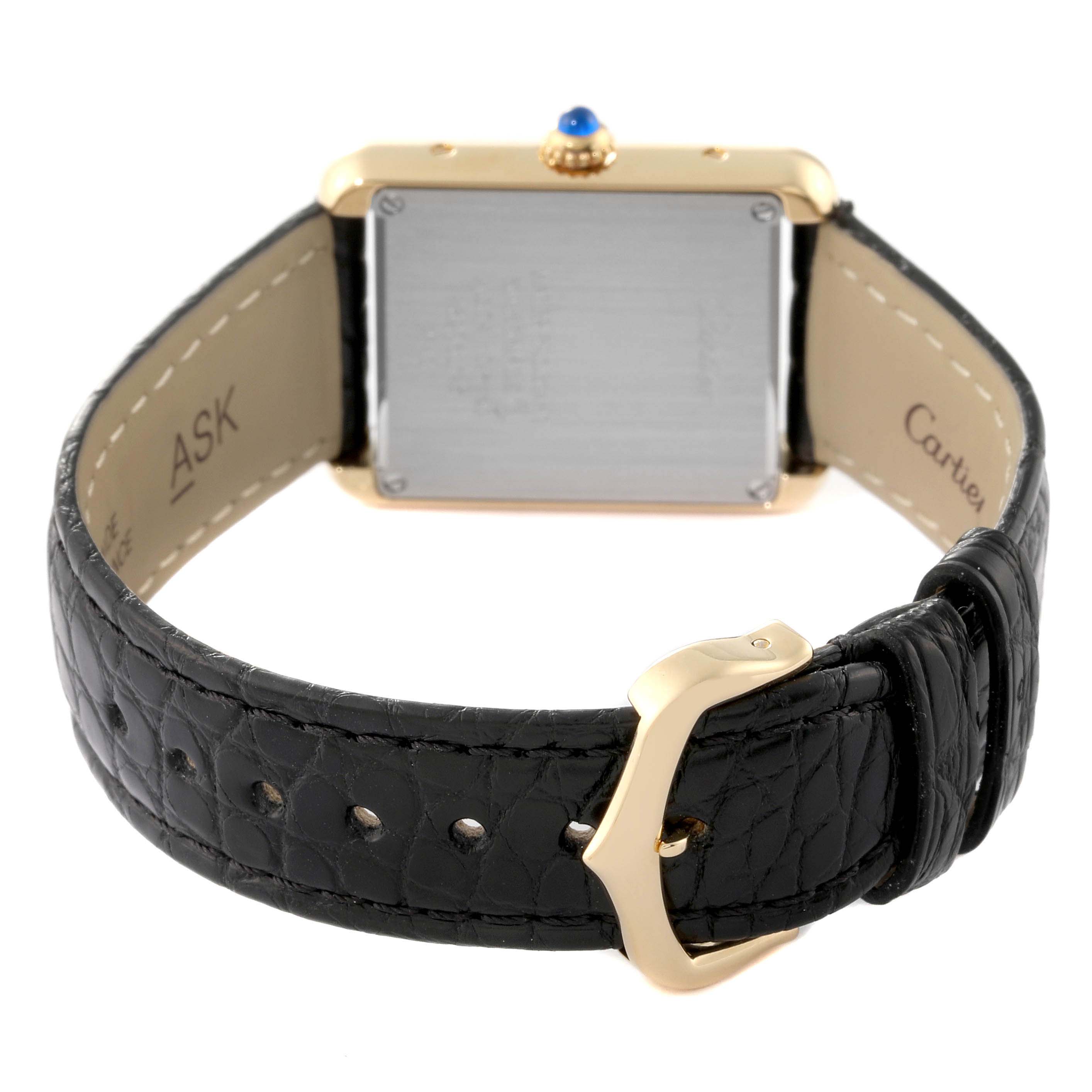 The image shows the back view of a Cartier Tank Solo W1018755 Women's Yellow Gold Silver Dial W1018755 Women's Yellow Gold Silver Dial watch, displaying its black leather strap and gold buckle.