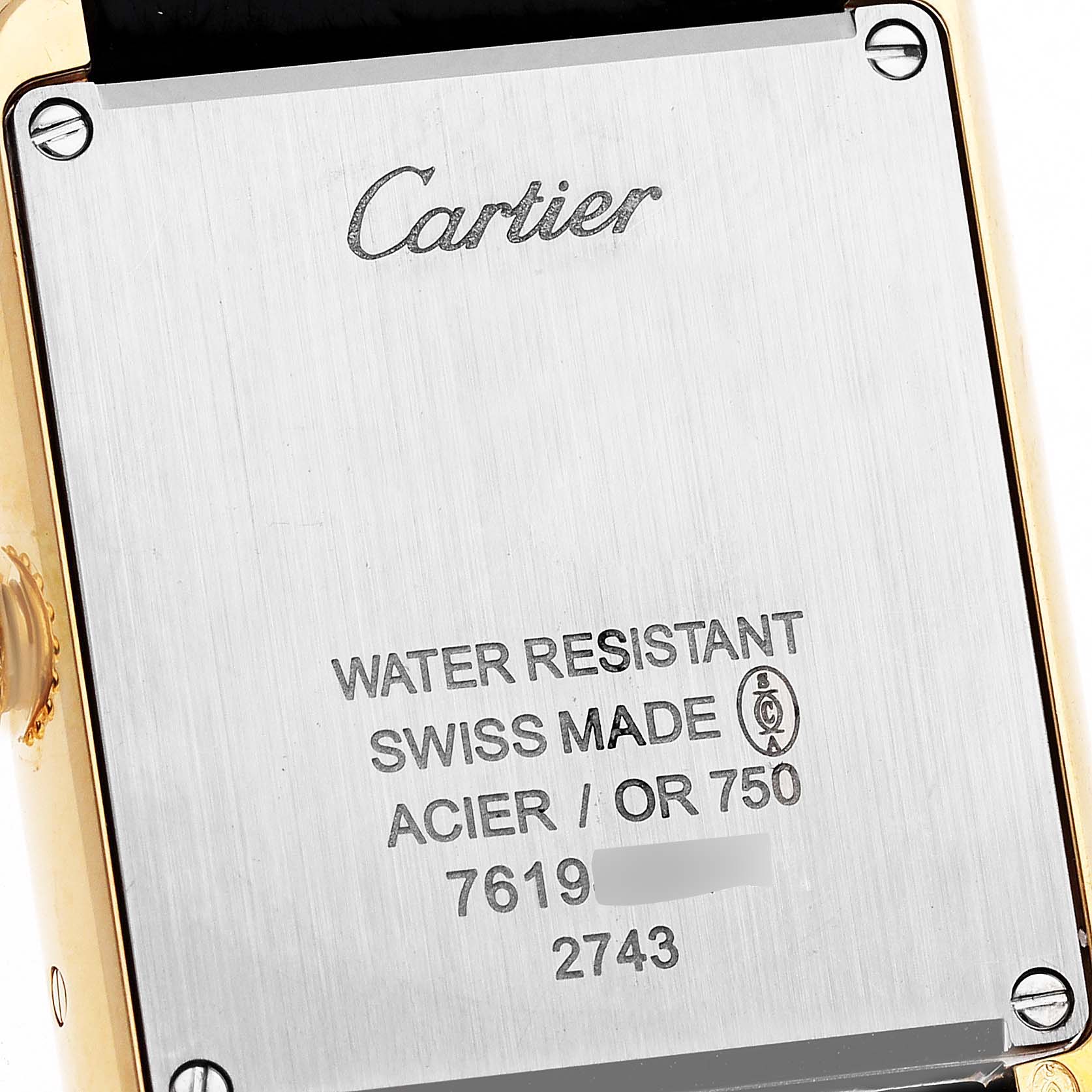 The image shows the back case of a Tank Solo model watch by Cartier, highlighting its branding and specifications.