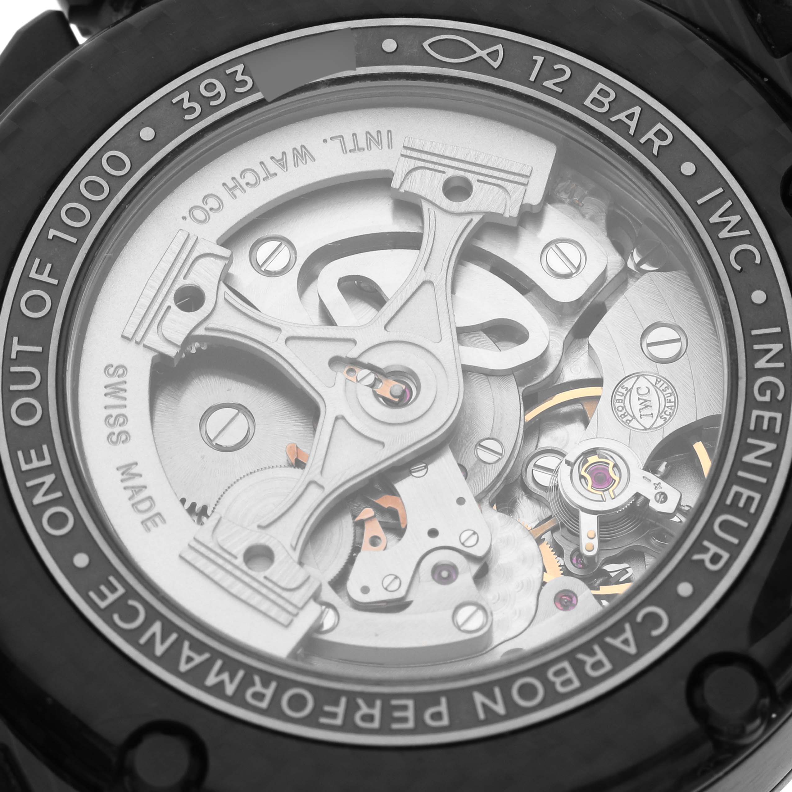 The image shows the movement and intricate inner workings through the exhibition case back of an IWC Ingenieur IW322404 Men's Ceramic Black Dial IW322404 Men's Ceramic Black Dial model watch.