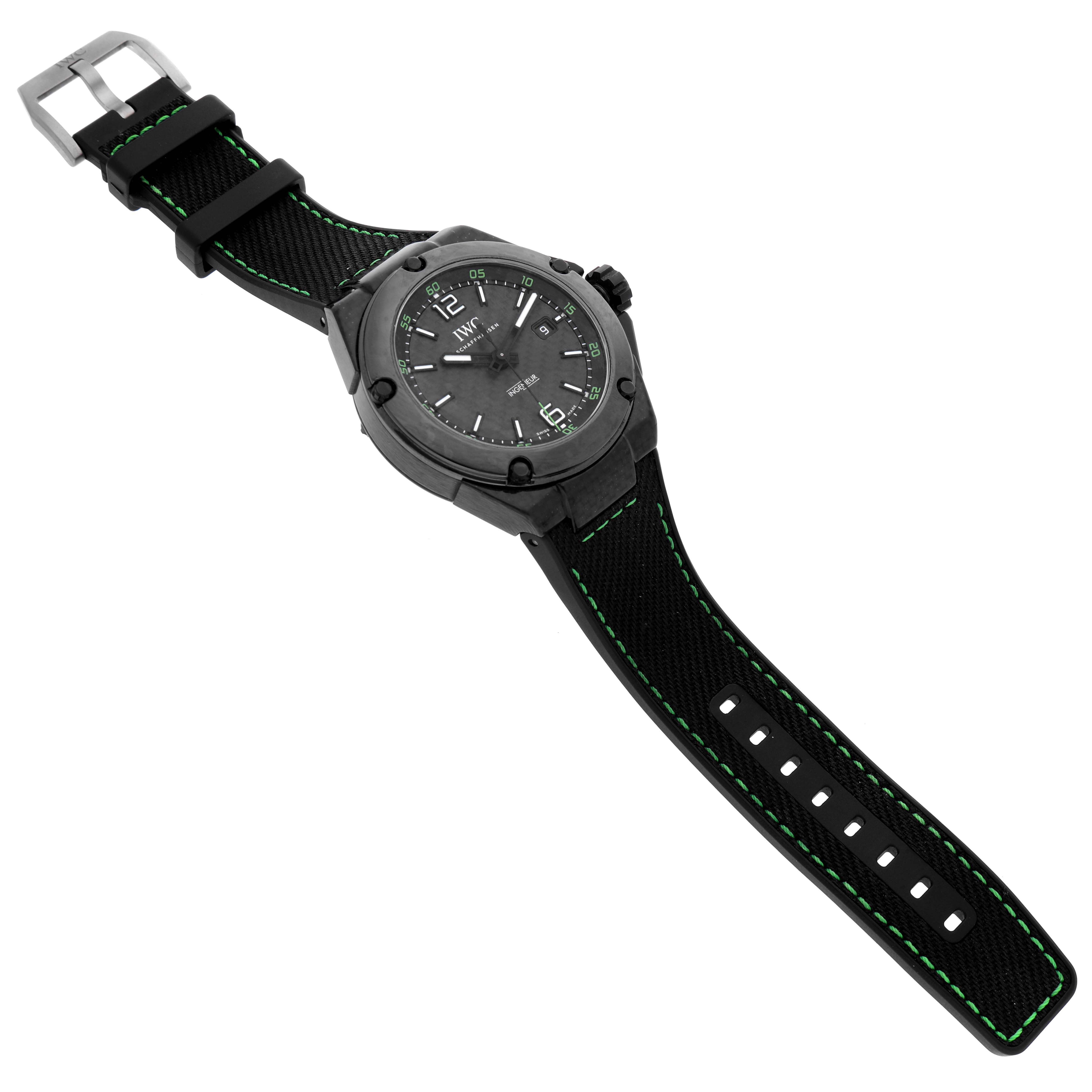 The IWC Ingenieur IW322404 Men's Ceramic Black Dial IW322404 Men's Ceramic Black Dial watch is shown from a top-down angle, displaying the dial, case, strap, and buckle.