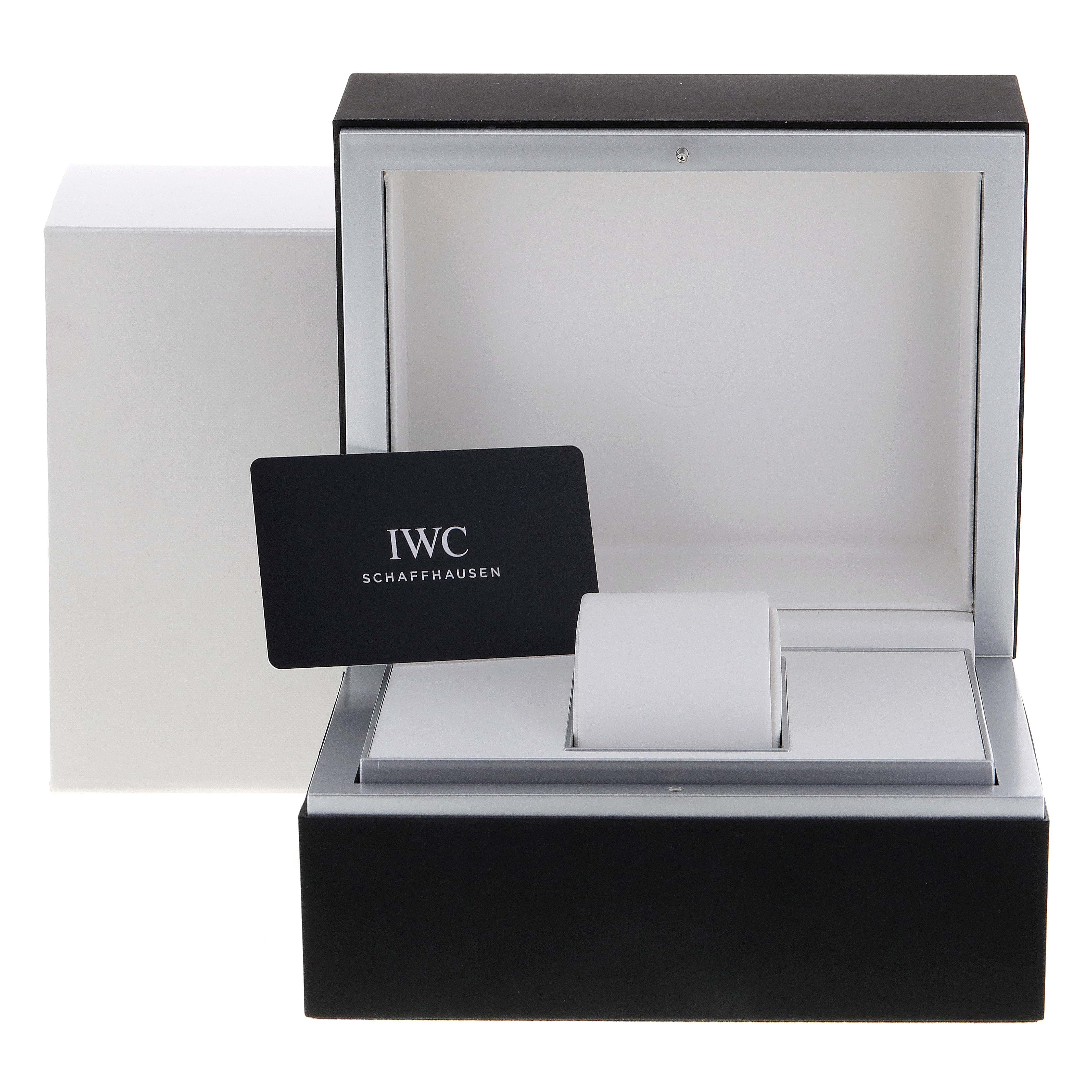 The image shows the open packaging box and card of an IWC Pilot IW327017 Men's Stainless Steel Silver Dial IW327017 Men's Stainless Steel Silver Dial model watch.