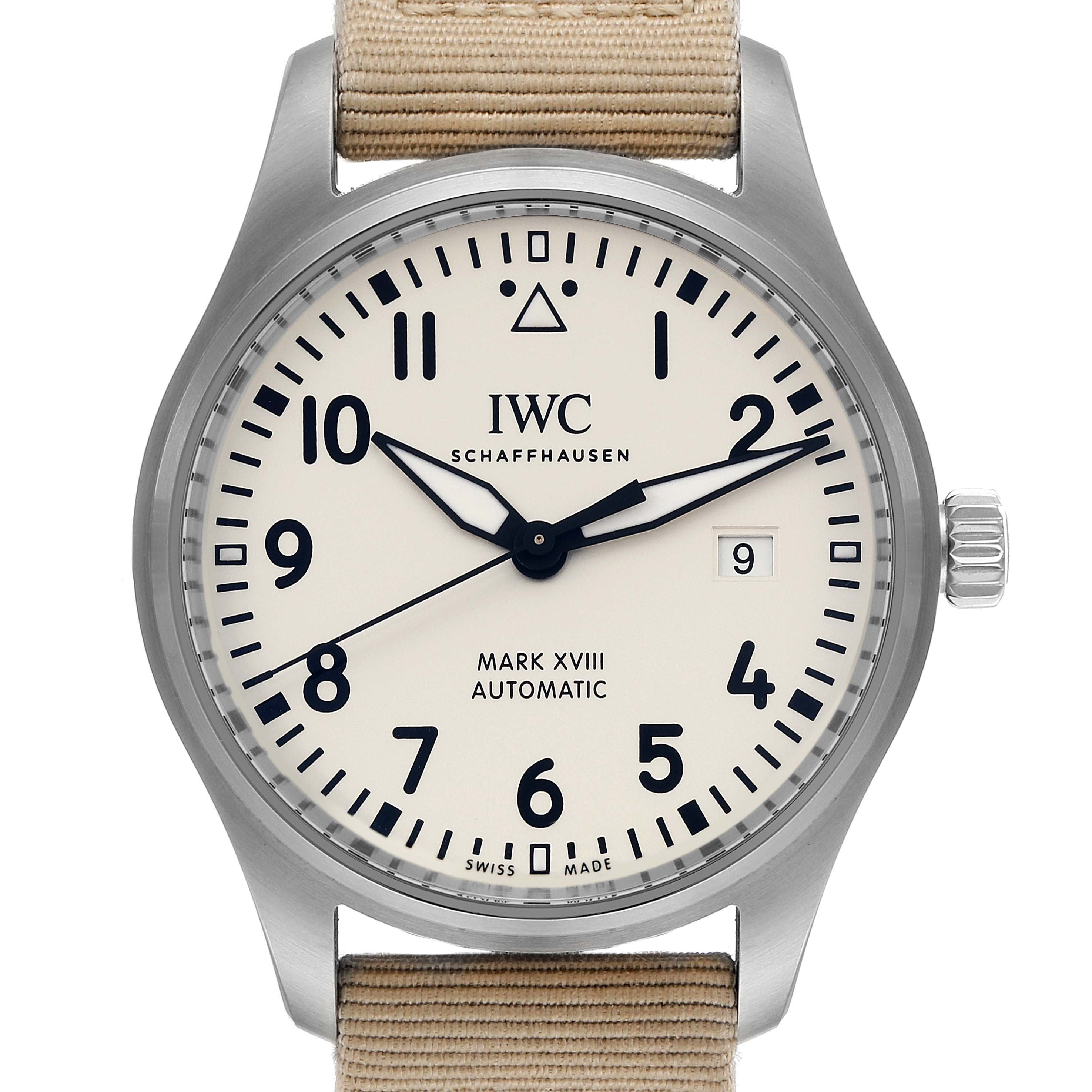 The image shows a frontal view of the IWC Pilot IW327017 Men's Stainless Steel Silver Dial IW327017 Men's Stainless Steel Silver Dial Mark XVIII Automatic watch, highlighting its face, hands, crown, and beige strap.