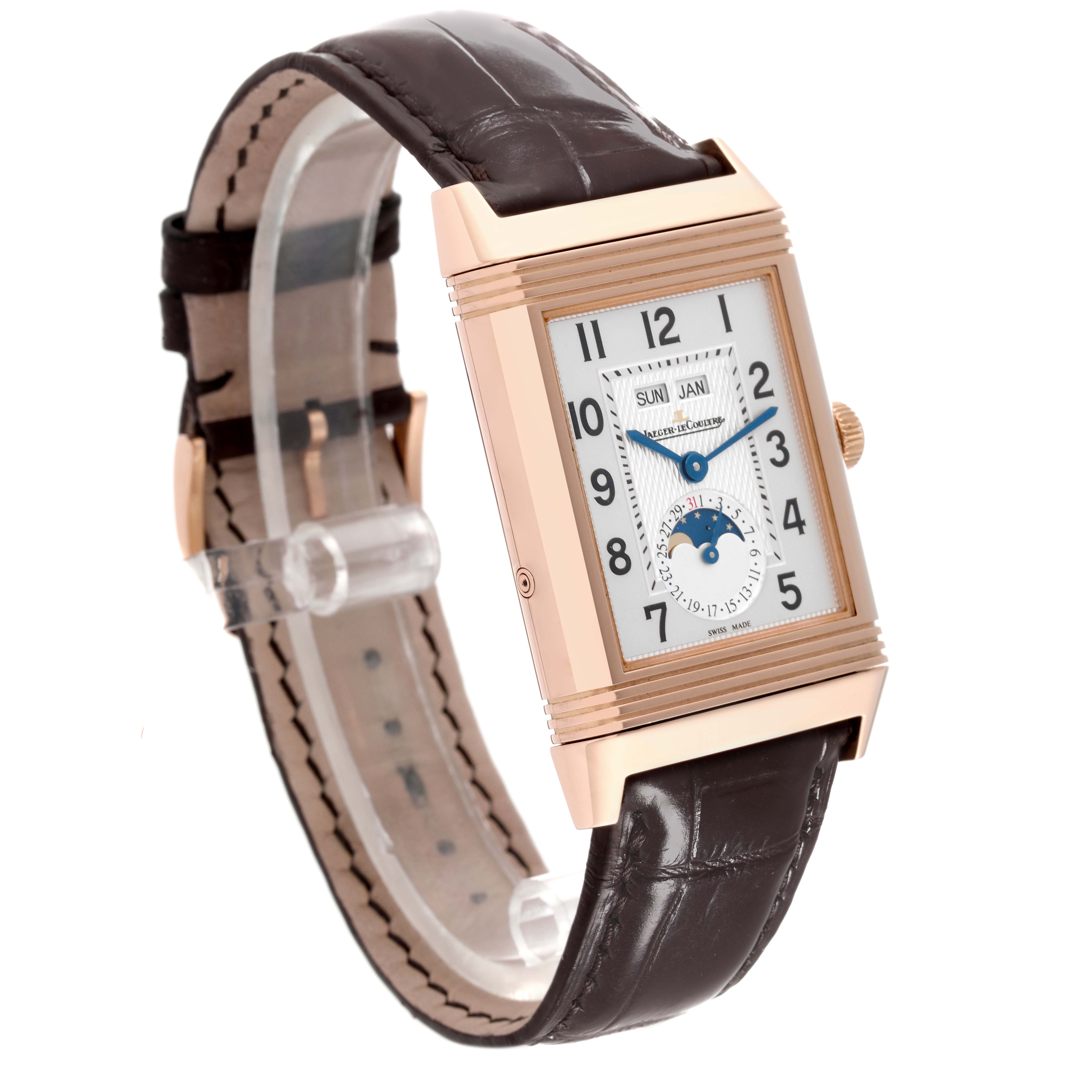 This image shows the Jaeger-LeCoultre Reverso watch at an angle, highlighting its rectangular face, leather strap, and multiple dials.