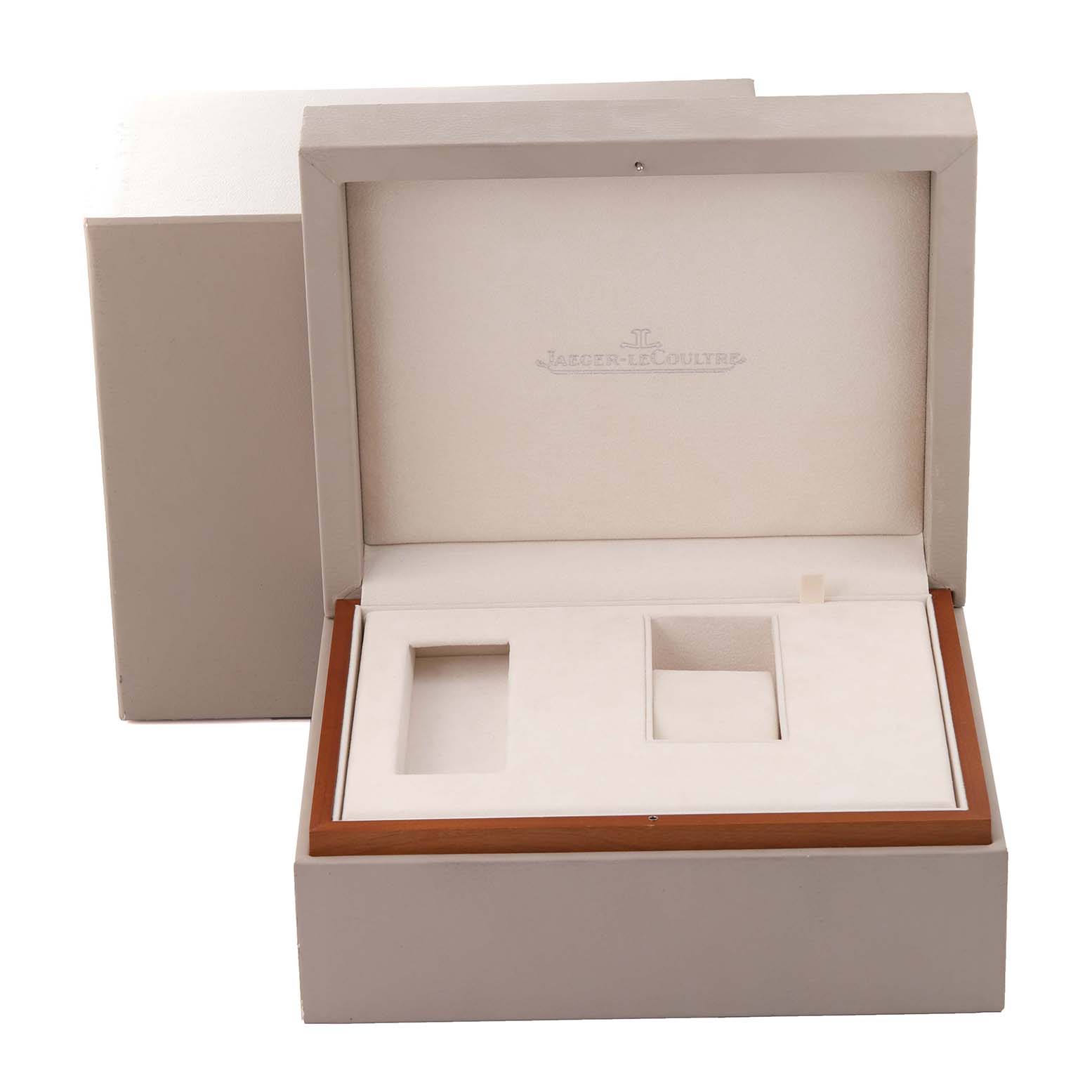 The image shows an open case for a Jaeger-LeCoultre Reverso watch, viewed from the front, displaying its compartments.