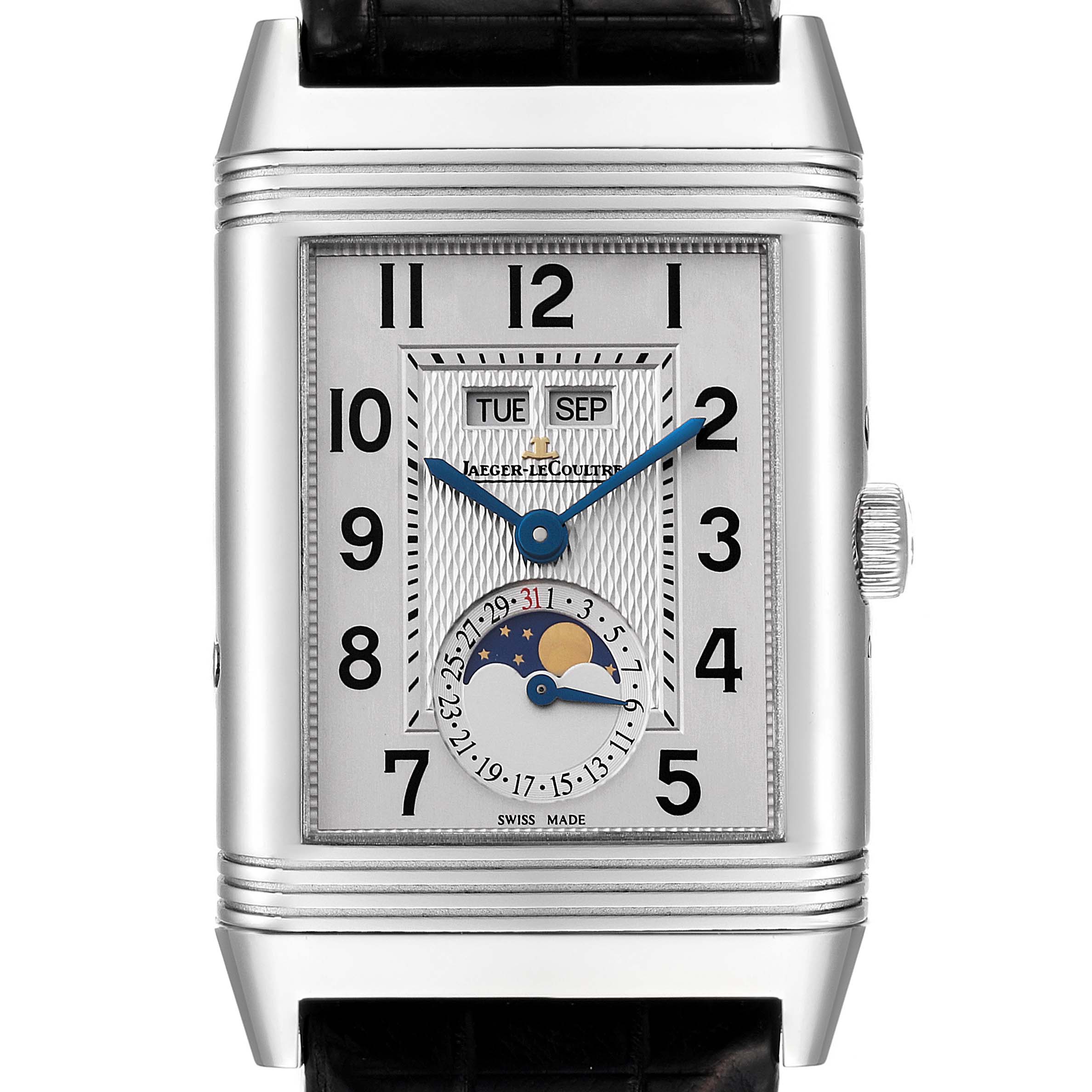 This image shows a frontal view of the Jaeger-LeCoultre Reverso watch displaying time, day, month, and moon phase.