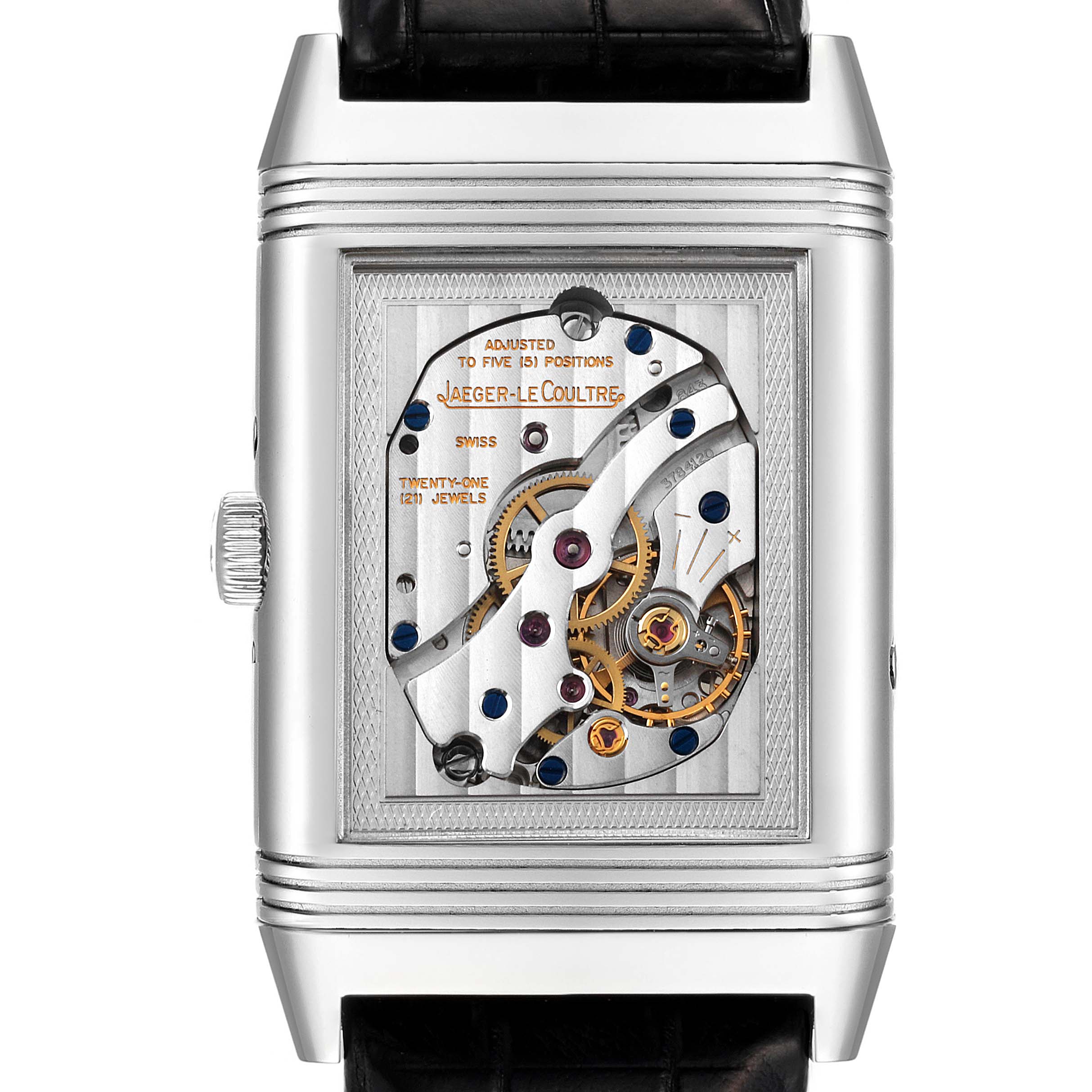 The image shows a close-up view of the movement mechanism of a Jaeger-LeCoultre Reverso watch.