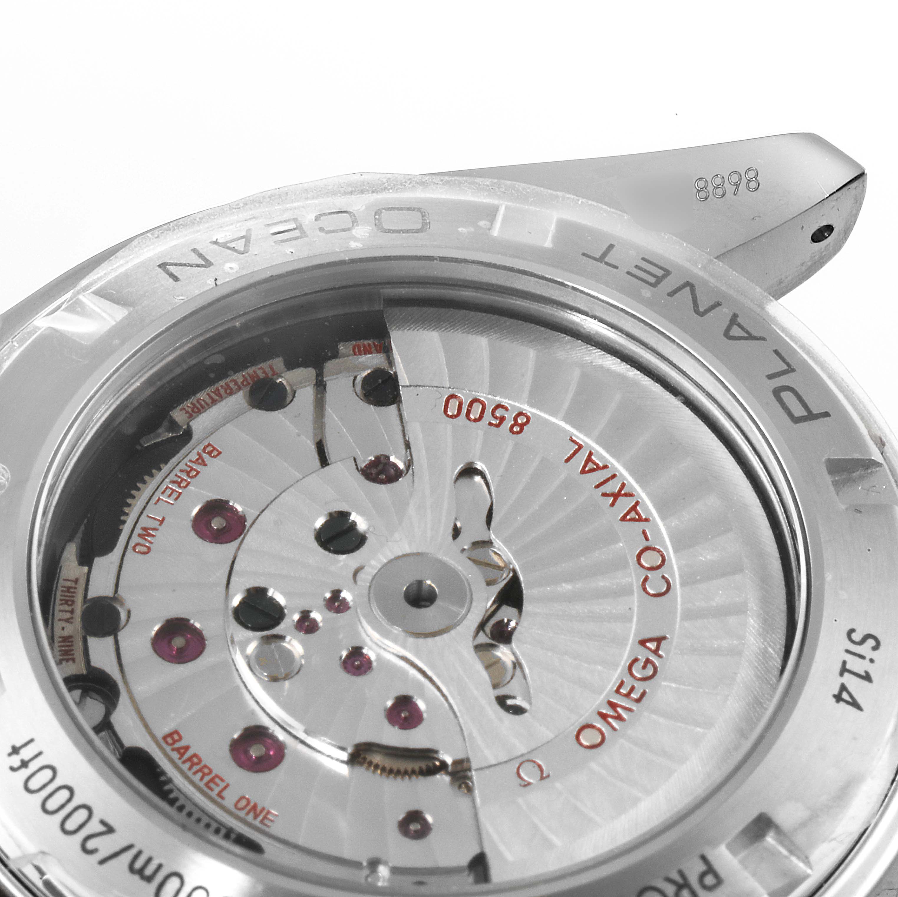 The image shows the back view of the Omega Seamaster 232.30.46.21.01.002 Men's Stainless Steel Black Dial 232.30.46.21.01.002 Men's Stainless Steel Black Dial watch, revealing its co-axial movement and inner mechanics.