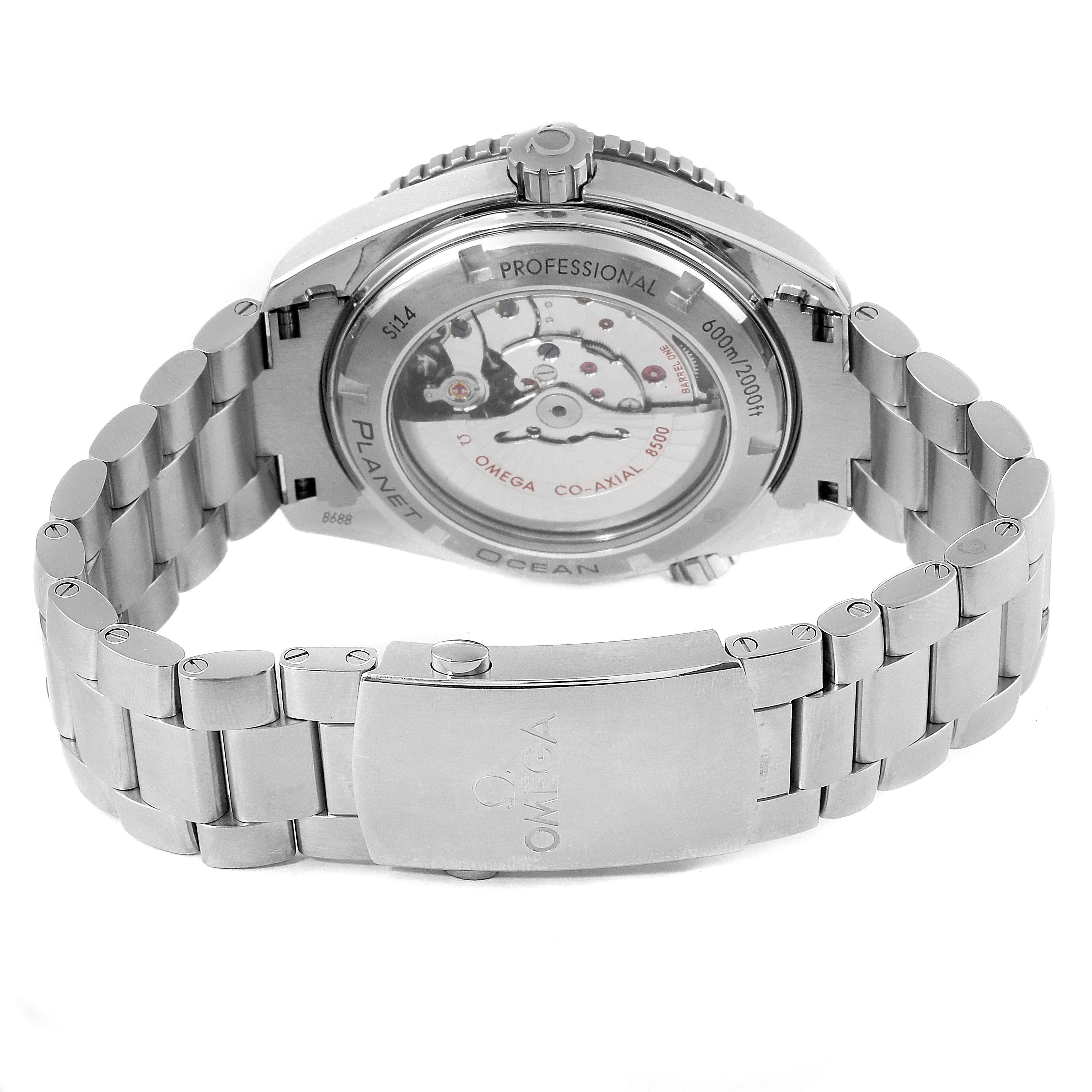 The image shows the back of an Omega Seamaster 232.30.46.21.01.002 Men's Stainless Steel Black Dial 232.30.46.21.01.002 Men's Stainless Steel Black Dial watch, focusing on the bracelet and the transparent case back revealing the movement.