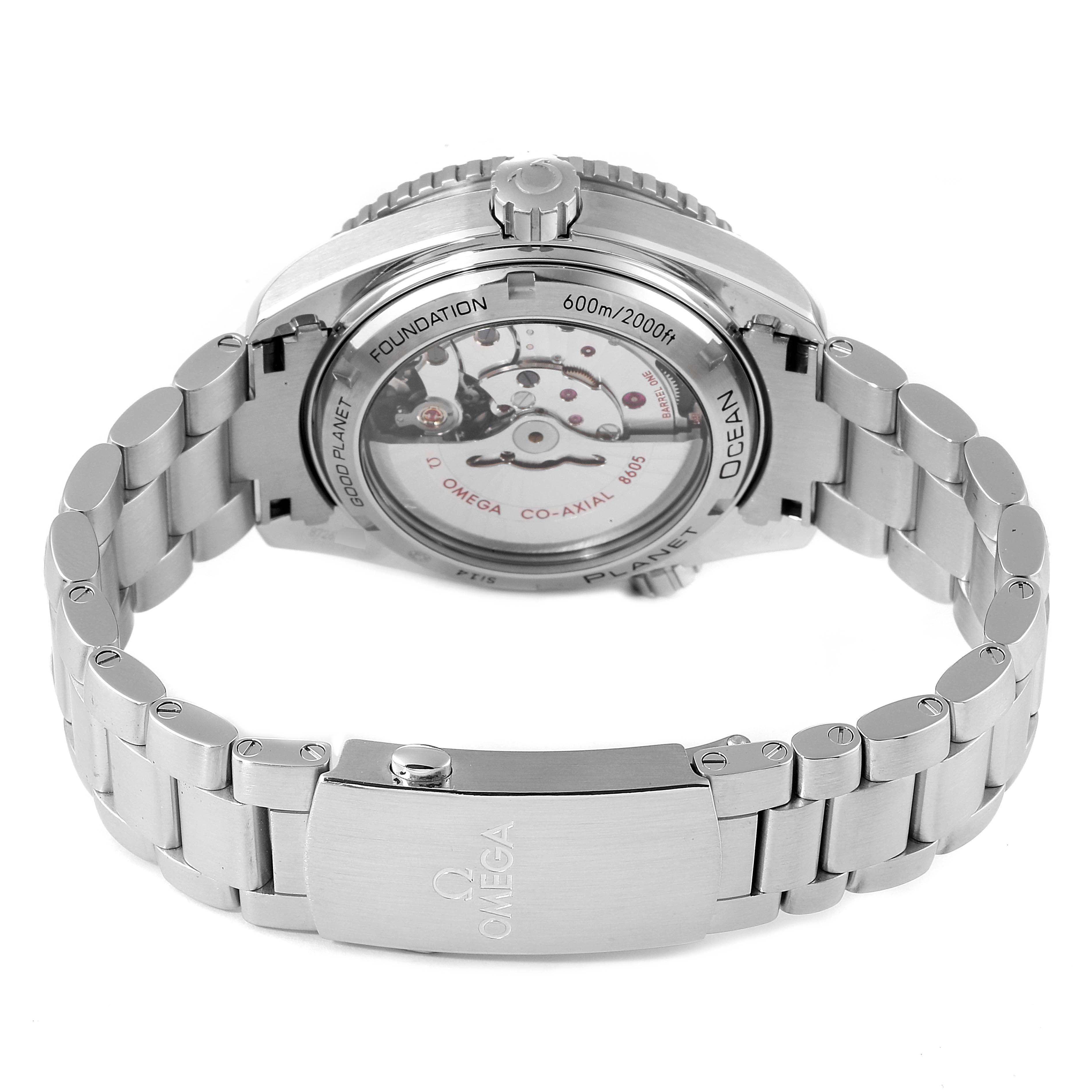 This image shows the rear view of the Omega Planet Ocean 232.30.44.22.03.001 Men's Stainless Steel Blue Dial 232.30.44.22.03.001 Men's Stainless Steel Blue Dial watch, highlighting its movement and stainless steel bracelet.