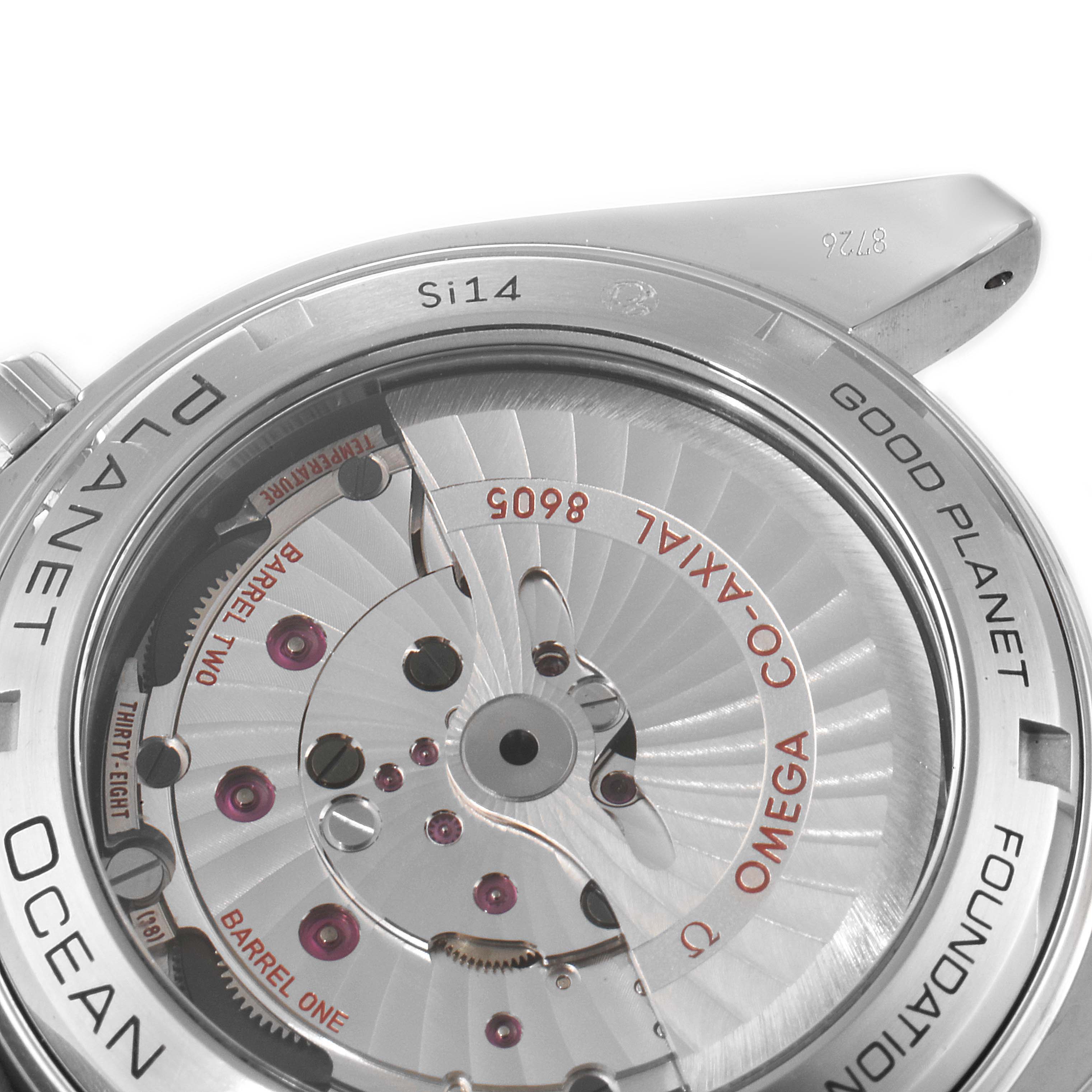 This image shows the back case and intricate movement of the Omega Planet Ocean 232.30.44.22.03.001 Men's Stainless Steel Blue Dial 232.30.44.22.03.001 Men's Stainless Steel Blue Dial watch at a close-up angle.