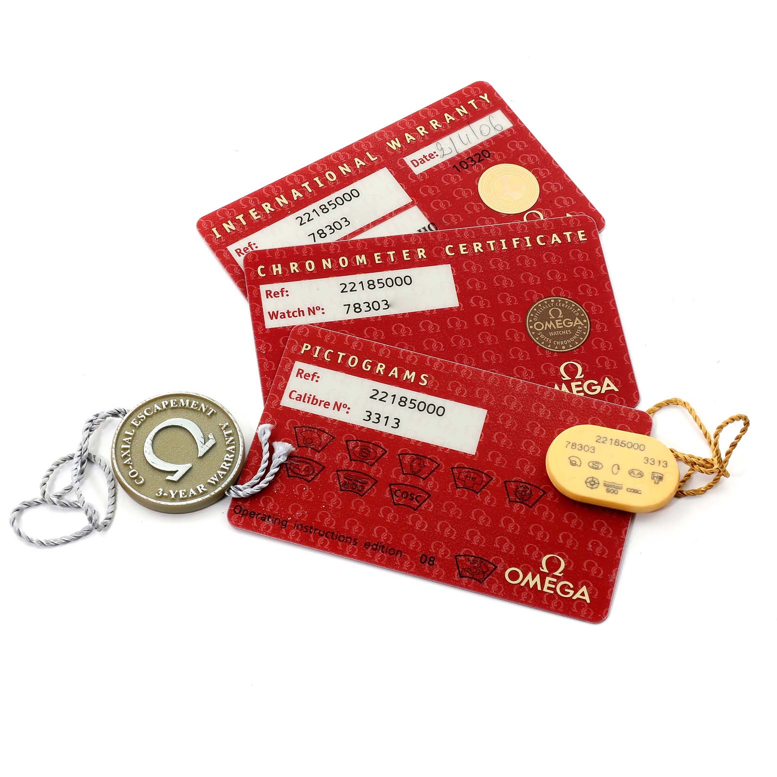 The image shows warranty cards, a chronometer certificate, and accessories for the Omega Planet Ocean 2218.50.00 Men
s Stainless Steel Black Dial 2218.50.00 Men
s Stainless Steel Black Dial model watch.