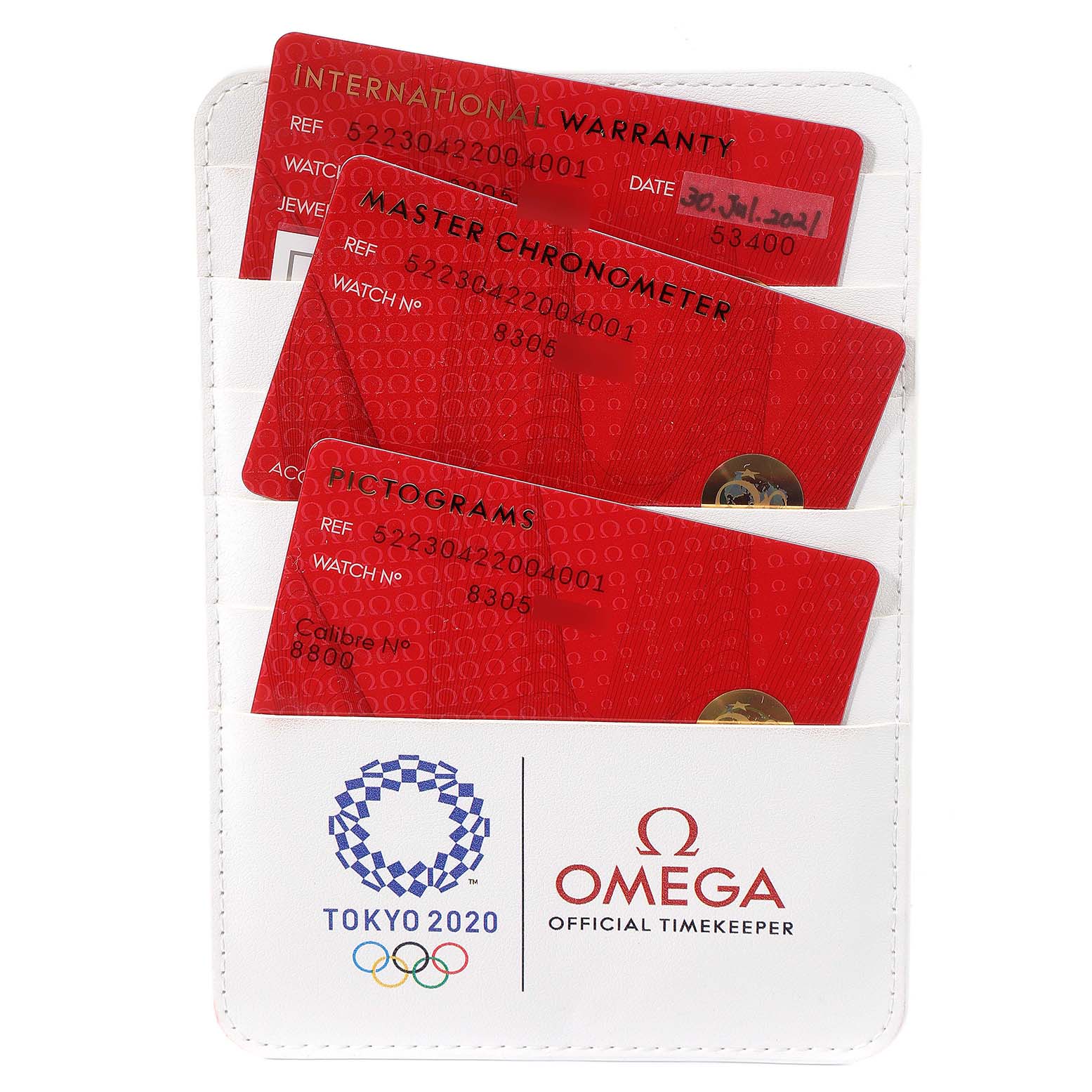 The image shows warranty and certification cards for the Omega Seamaster 522.30.42.20.04.001 Men's Stainless Steel White Dial 522.30.42.20.04.001 Men's Stainless Steel White Dial model, along with a branded cardholder.