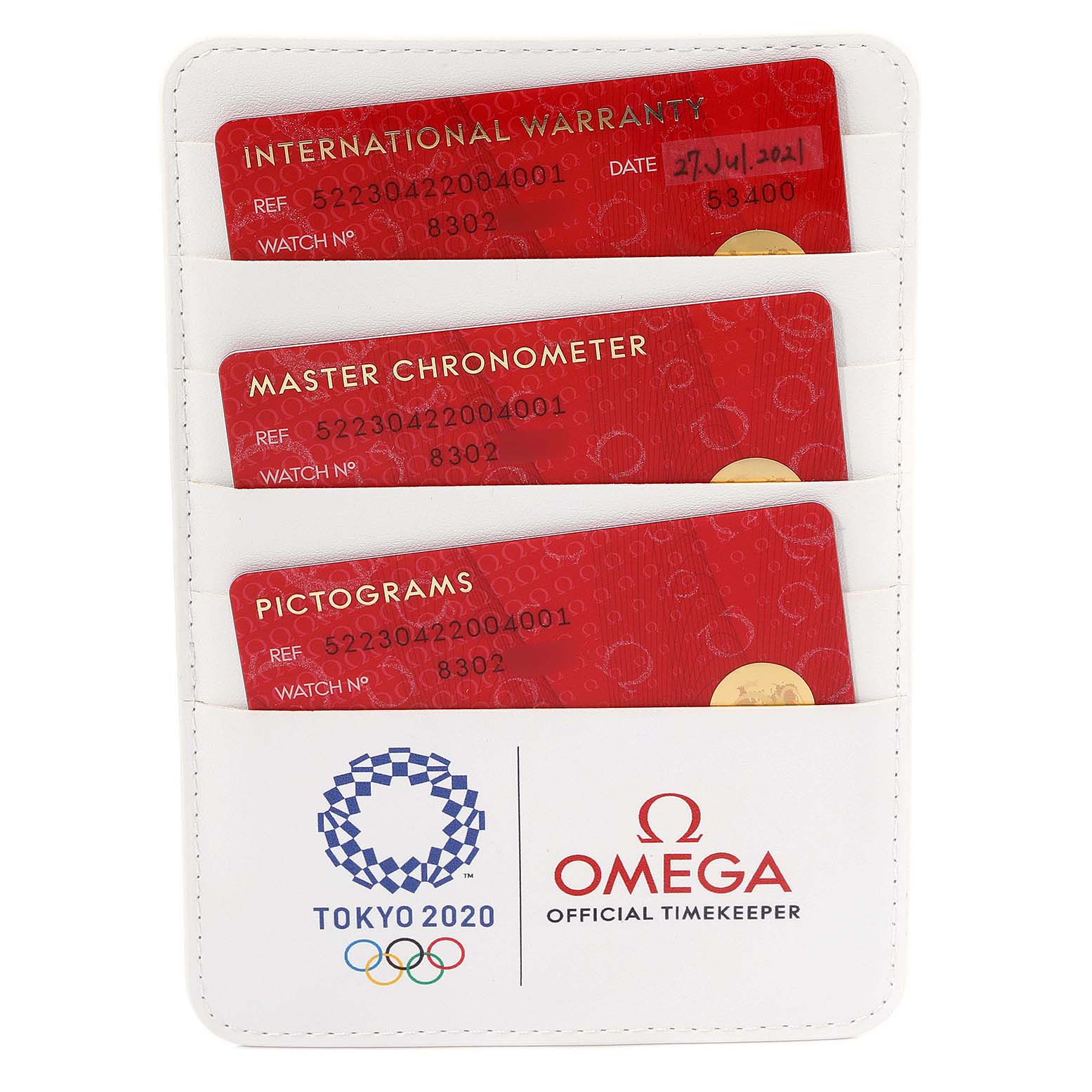 This image shows the warranty cards for an Omega Seamaster 522.30.42.20.04.001 Men's Stainless Steel White Dial 522.30.42.20.04.001 Men's Stainless Steel White Dial watch, displayed in a holder with the Tokyo 2020 and Omega logos.