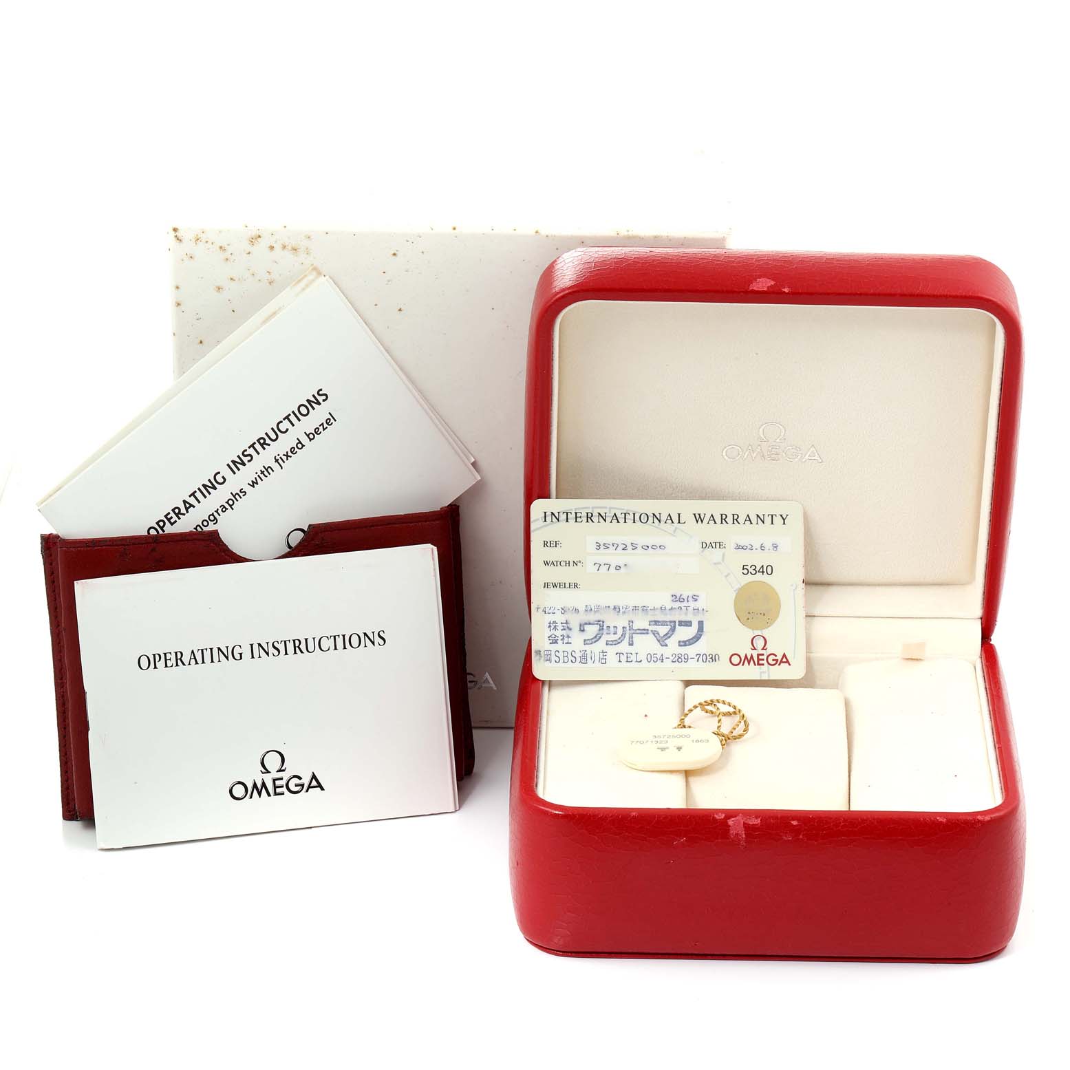 The image shows a red Omega Speedmaster 3572.50.00 Men
s Stainless Steel Black Dial 3572.50.00 Men
s Stainless Steel Black Dial watch box, an international warranty card, and operating instructions.