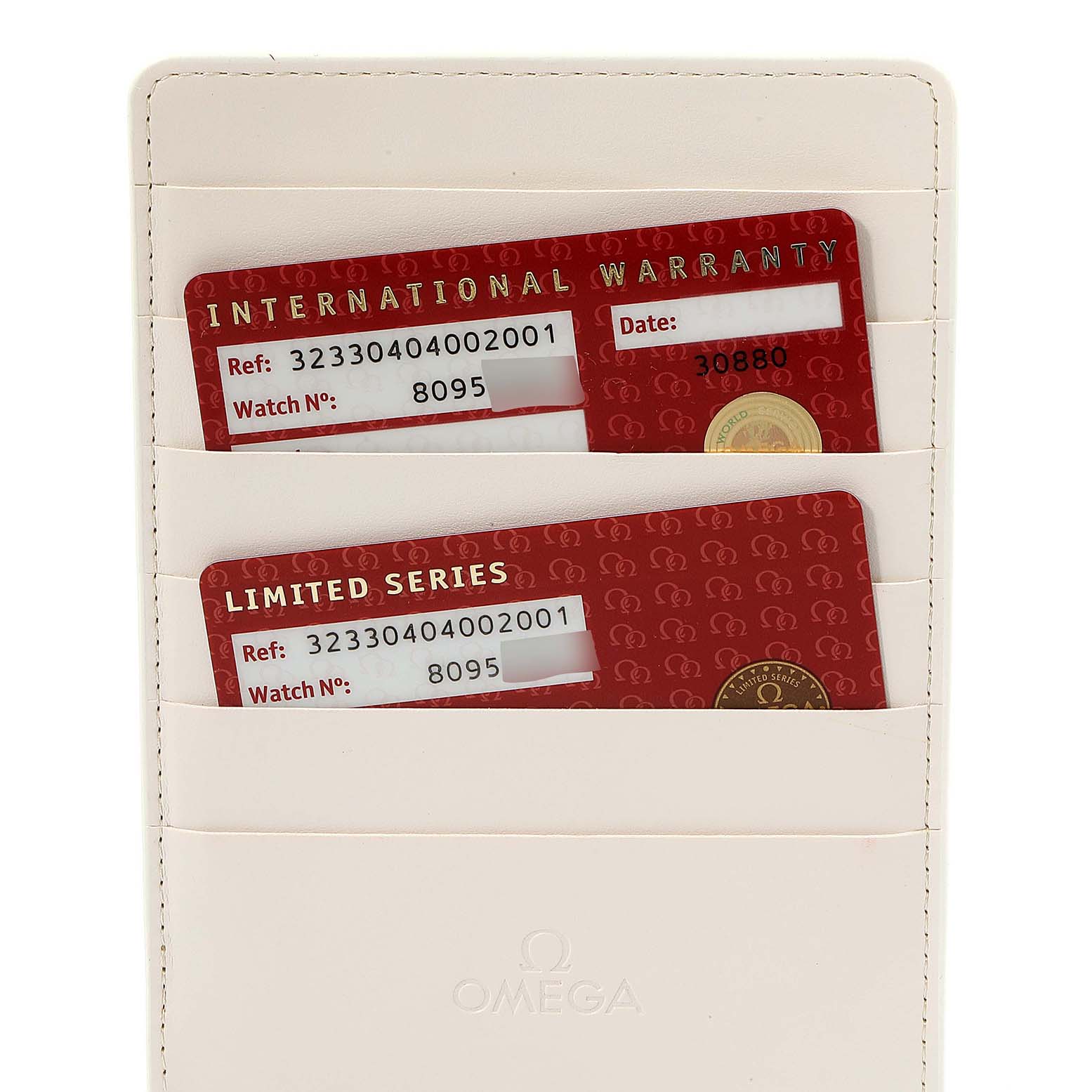 The image shows international warranty and limited series cards for an Omega Speedmaster 323.30.40.40.02.001 Men's Stainless Steel White Dial 323.30.40.40.02.001 Men's Stainless Steel White Dial watch in a white cardholder.