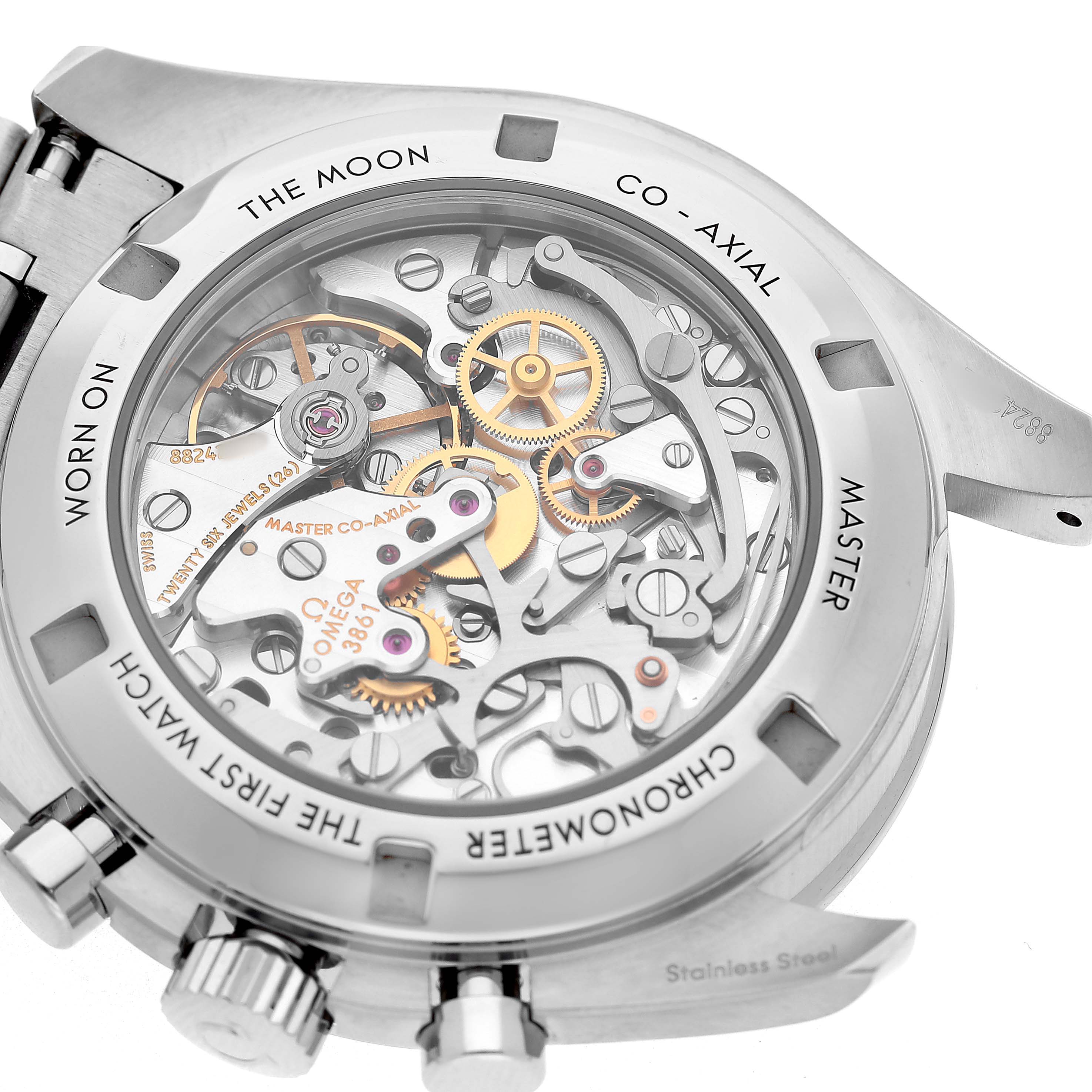 The image shows a back view of the Omega Speedmaster 310.30.42.50.04.001 Men's Stainless Steel White Dial, highlighting the intricate movement and mechanisms through a transparent case back.