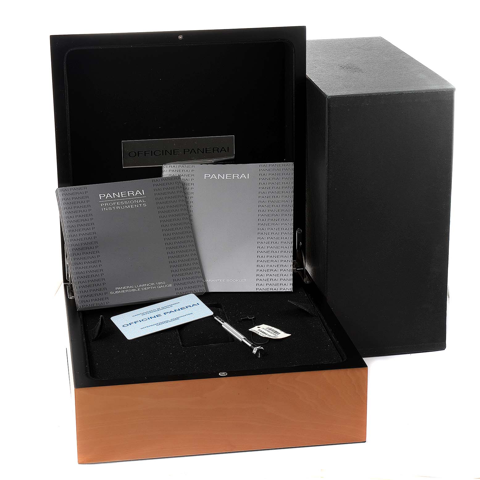 The image shows a Panerai Submersible PAM00193 Men's Titanium Black Dial PAM00193 Men's Titanium Black Dial watch box and its contents, including manuals, an authenticity card, and a tool.