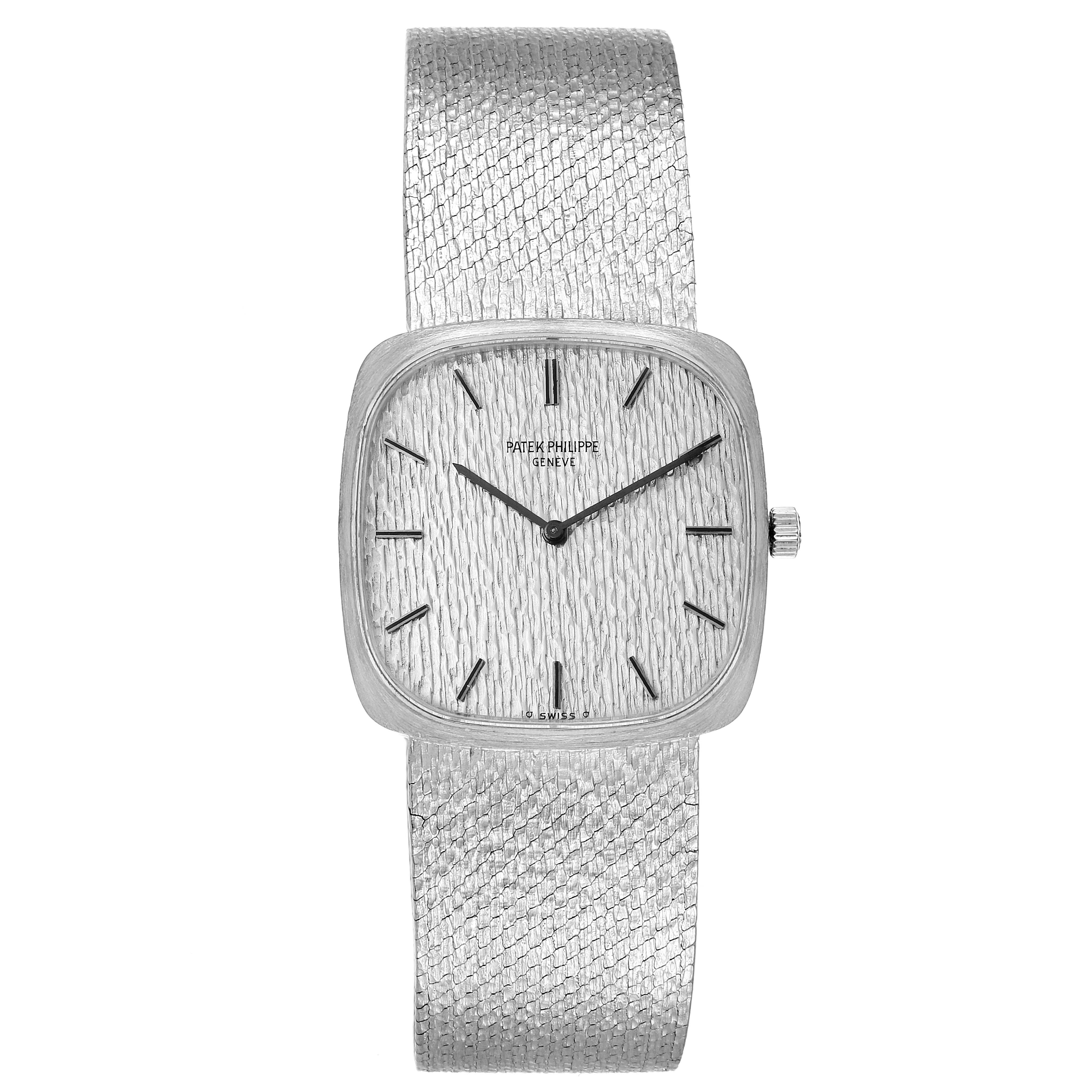 This is a front view of a vintage Patek Philippe watch, showing the square dial, textured band, and the entire face with hour markers and hands.