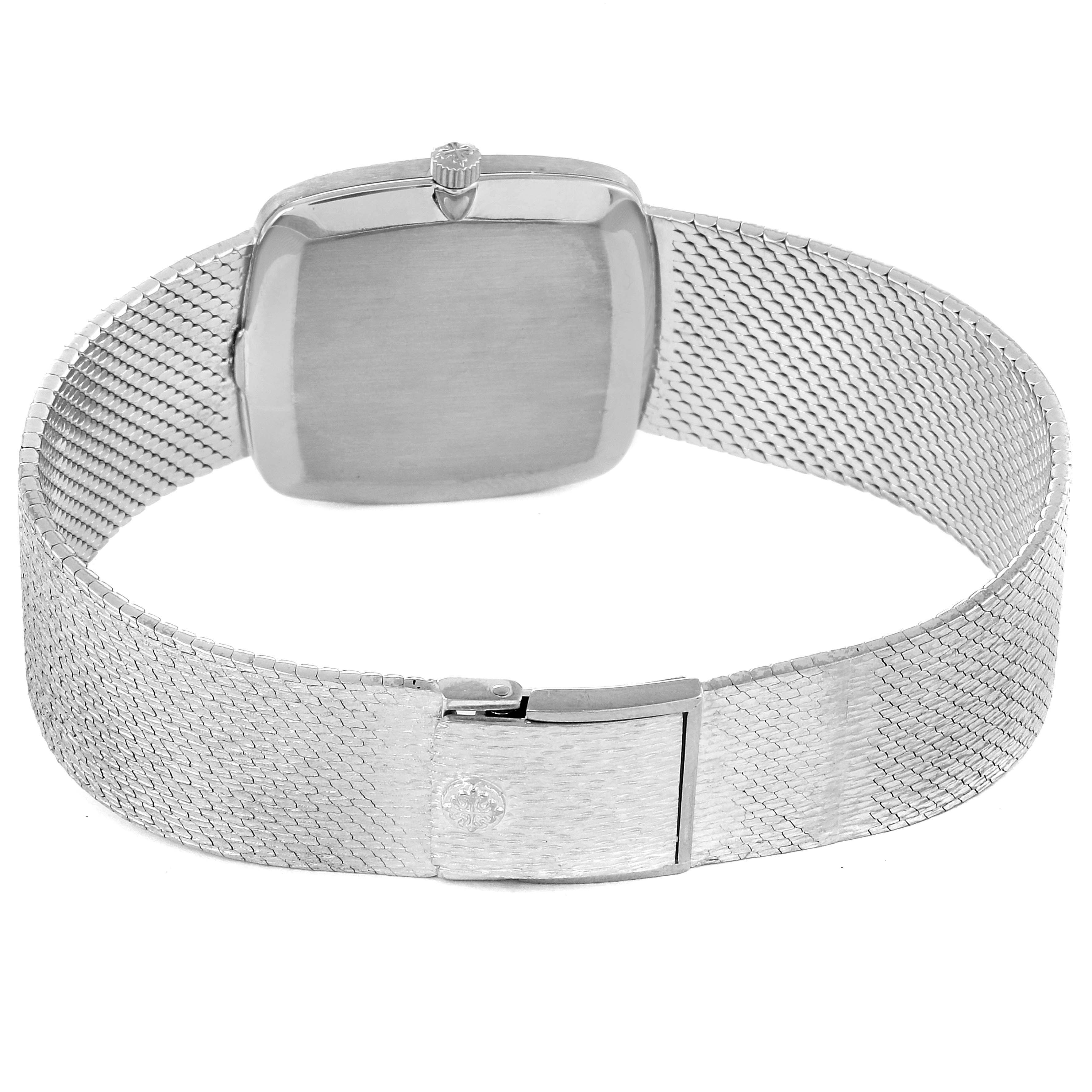 The image shows the back case and mesh bracelet of a Vintage Patek Philippe watch from a rear angle.