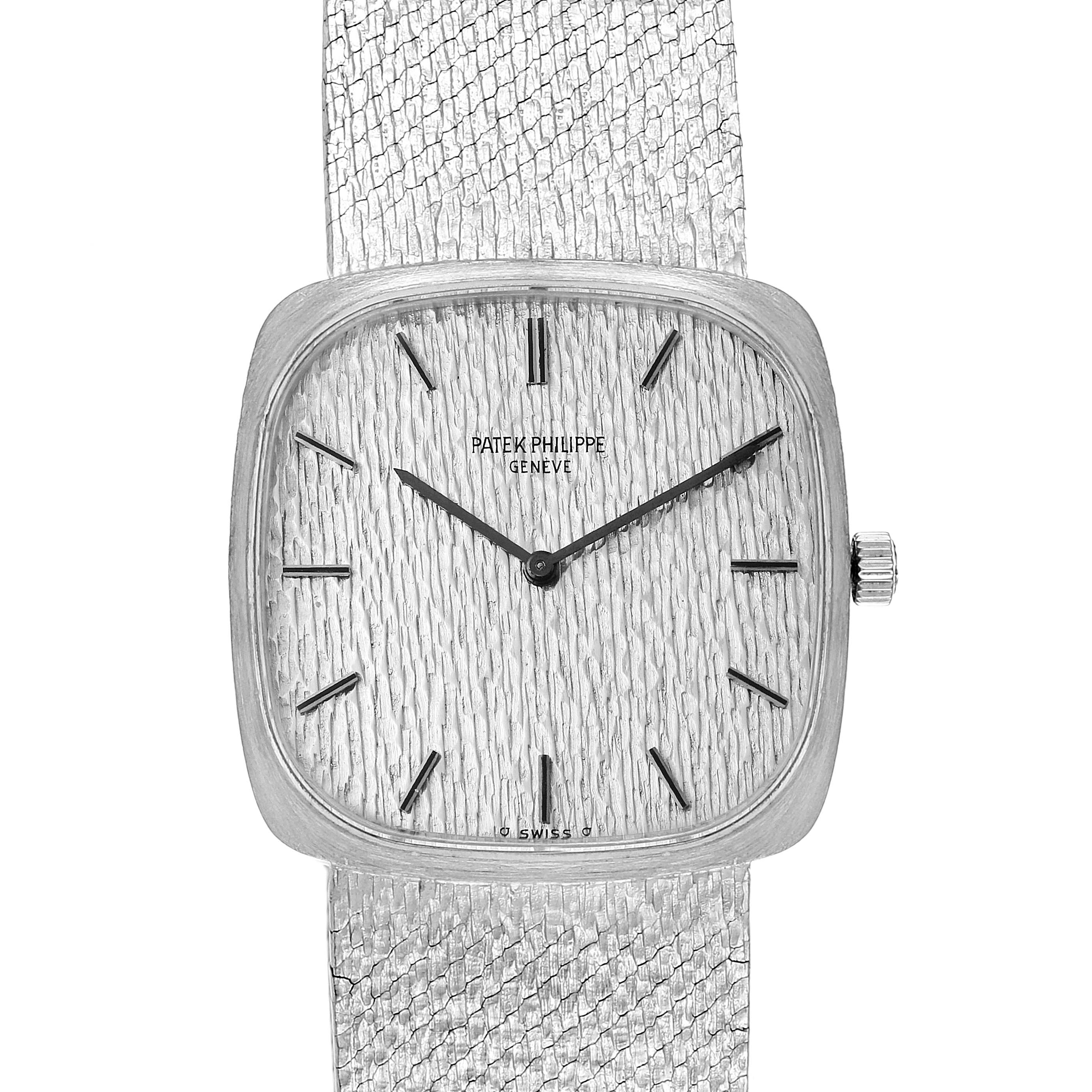 This image shows a front view of a Vintage Patek Philippe watch, displaying its dial, bezel, and part of the strap.