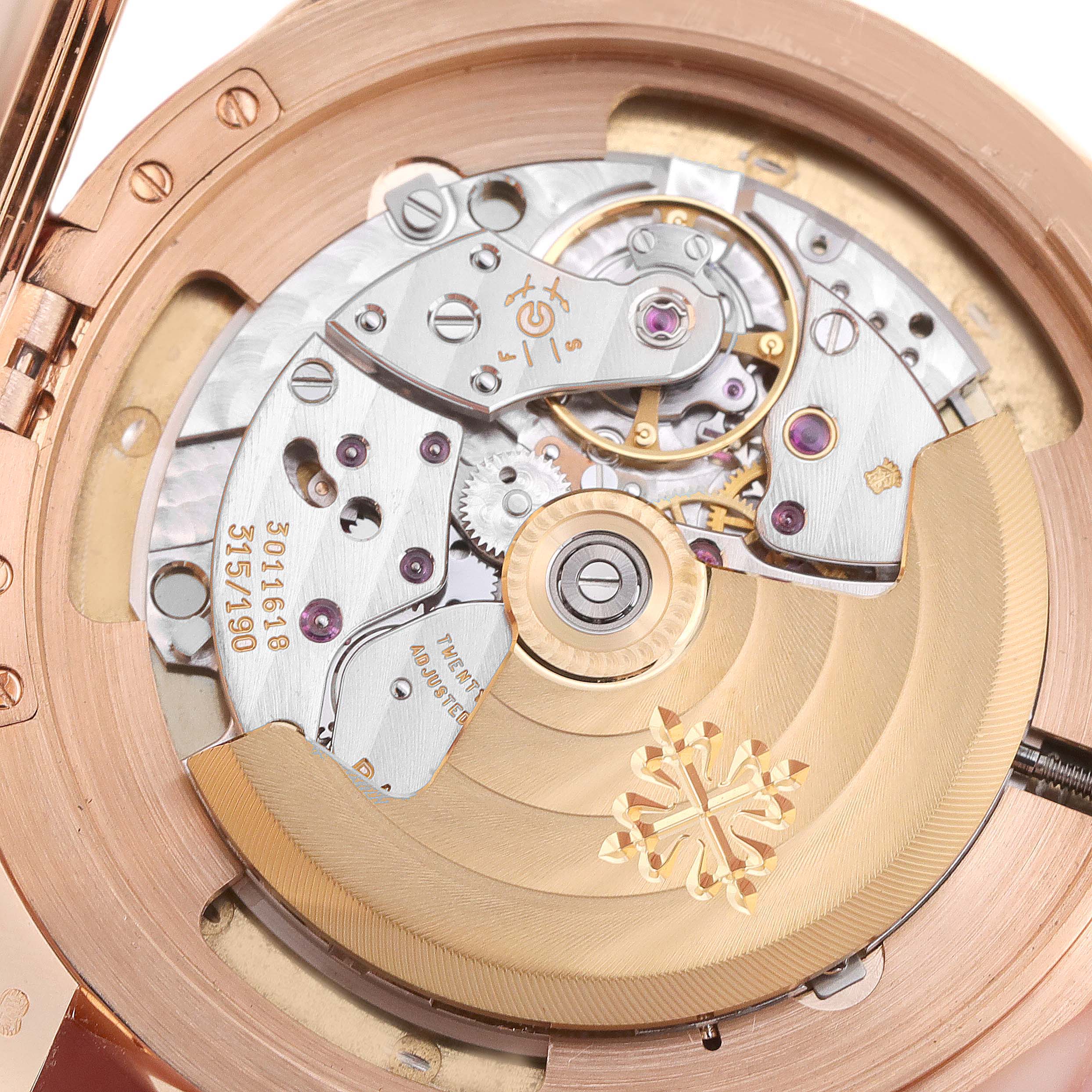 This image shows the intricate movement components of the Patek Philippe Calatrava 5227R-001 Men's Rose Gold Beige Dial 5227R-001 Men's Rose Gold Beige Dial model from a rear view angle.