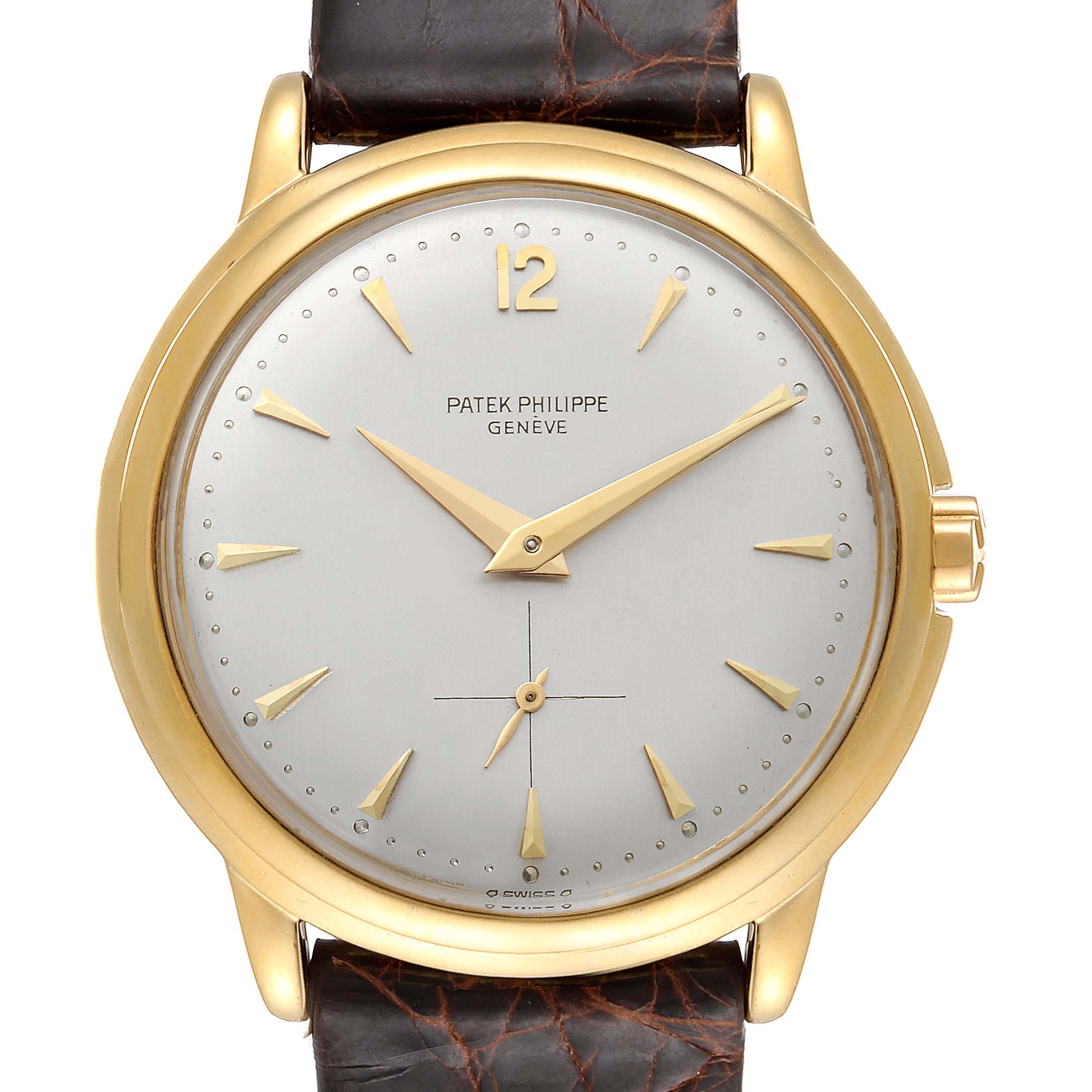 This image shows a close-up, front view of the Patek Philippe Calatrava 2552 Men's Yellow Gold Silver Dial 2552 Men's Yellow Gold Silver Dial watch, including its dial, hands, case, and part of the strap.