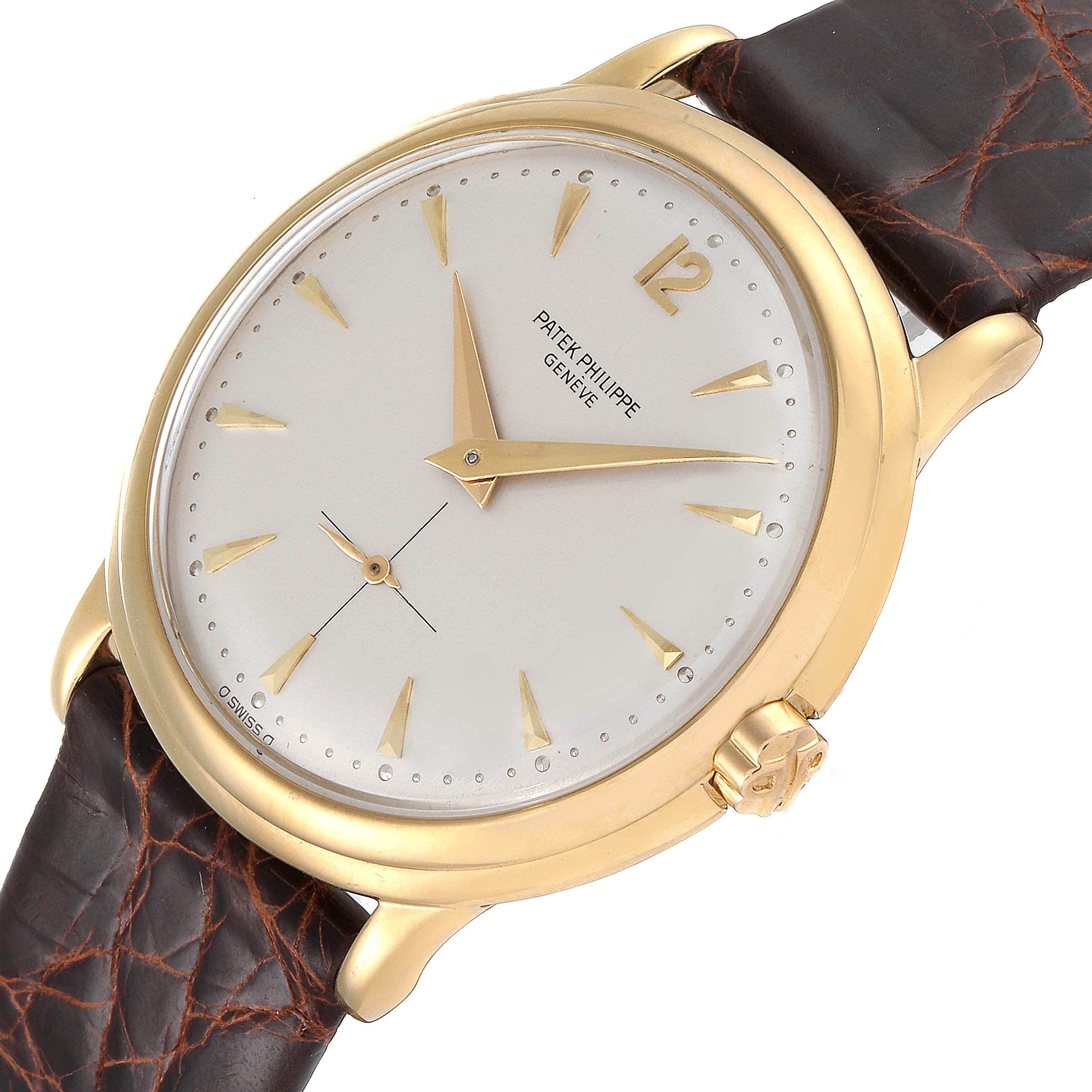 The image shows a slightly angled view of a Vintage Patek Philippe watch, displaying the face, dial, and part of the leather strap.