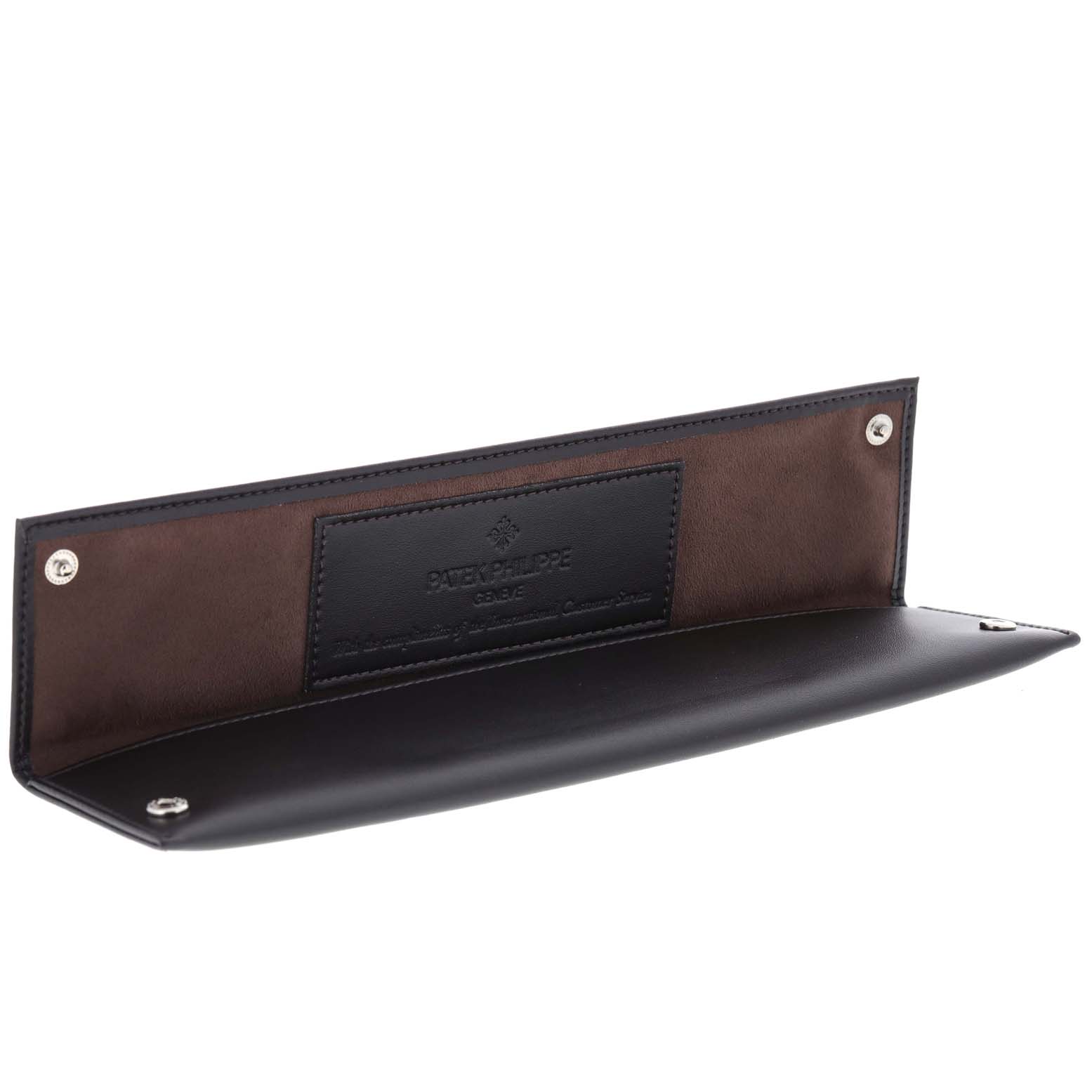 This is an open Patek Philippe leather watch pouch for a Vintage model, shown from a front angle.