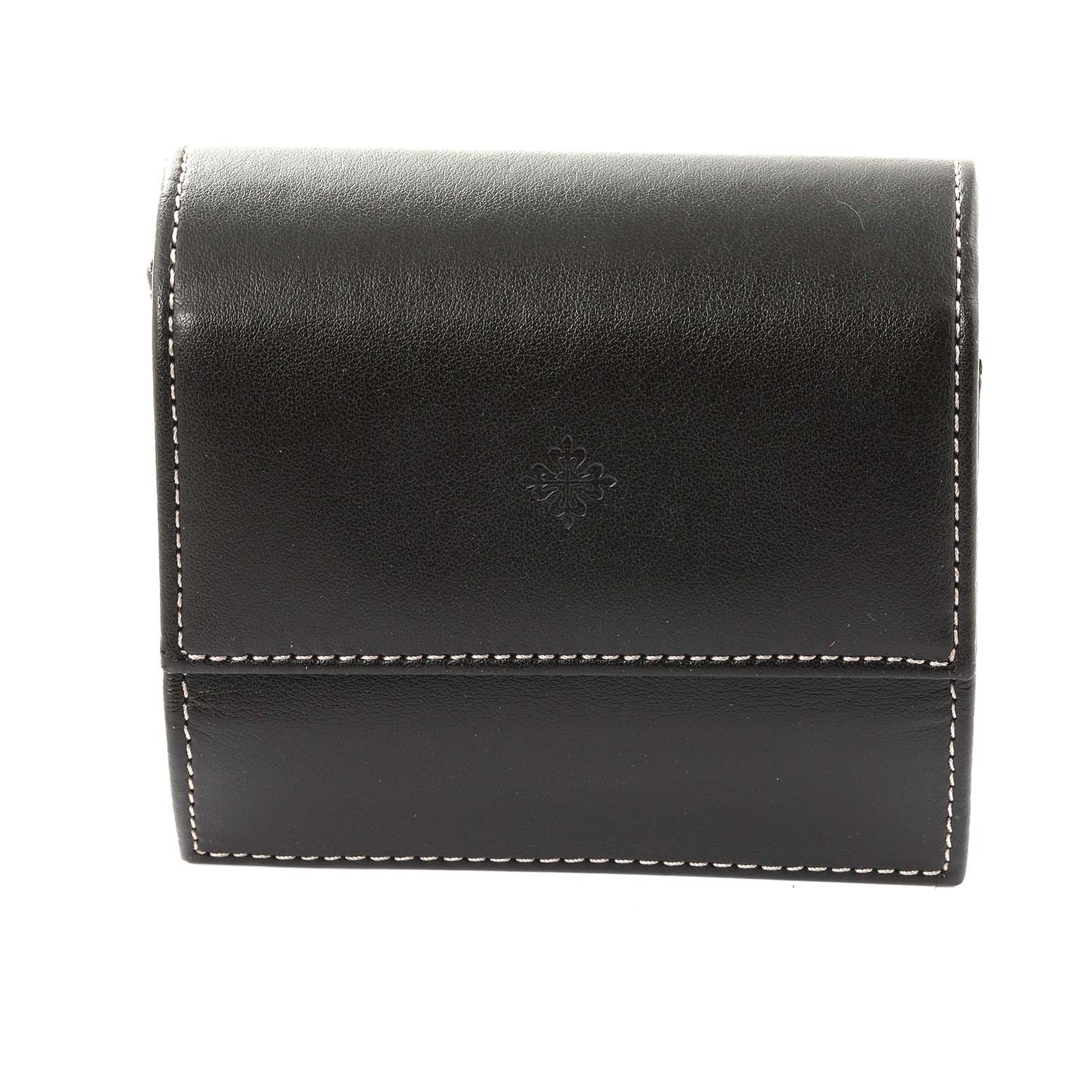 The image shows a black leather watch case for the Patek Philippe Calatrava 5119J-001 Men's Yellow Gold White Dial 5119J-001 Men's Yellow Gold White Dial model, viewed from the front.