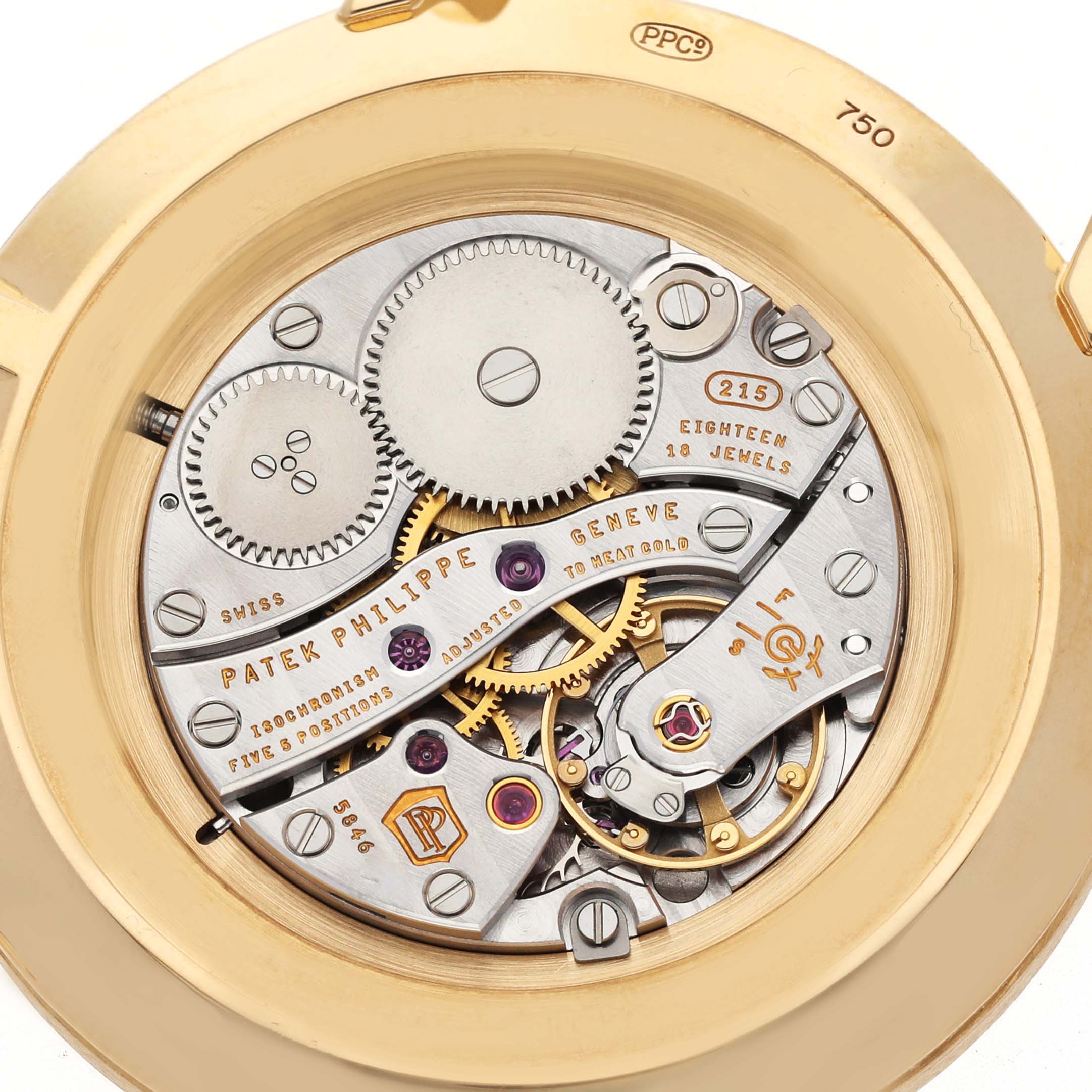 This image shows the intricate movement mechanism of a Patek Philippe Calatrava 5119J-001 Men's Yellow Gold White Dial 5119J-001 Men's Yellow Gold White Dial watch in a close-up, top-down angle.