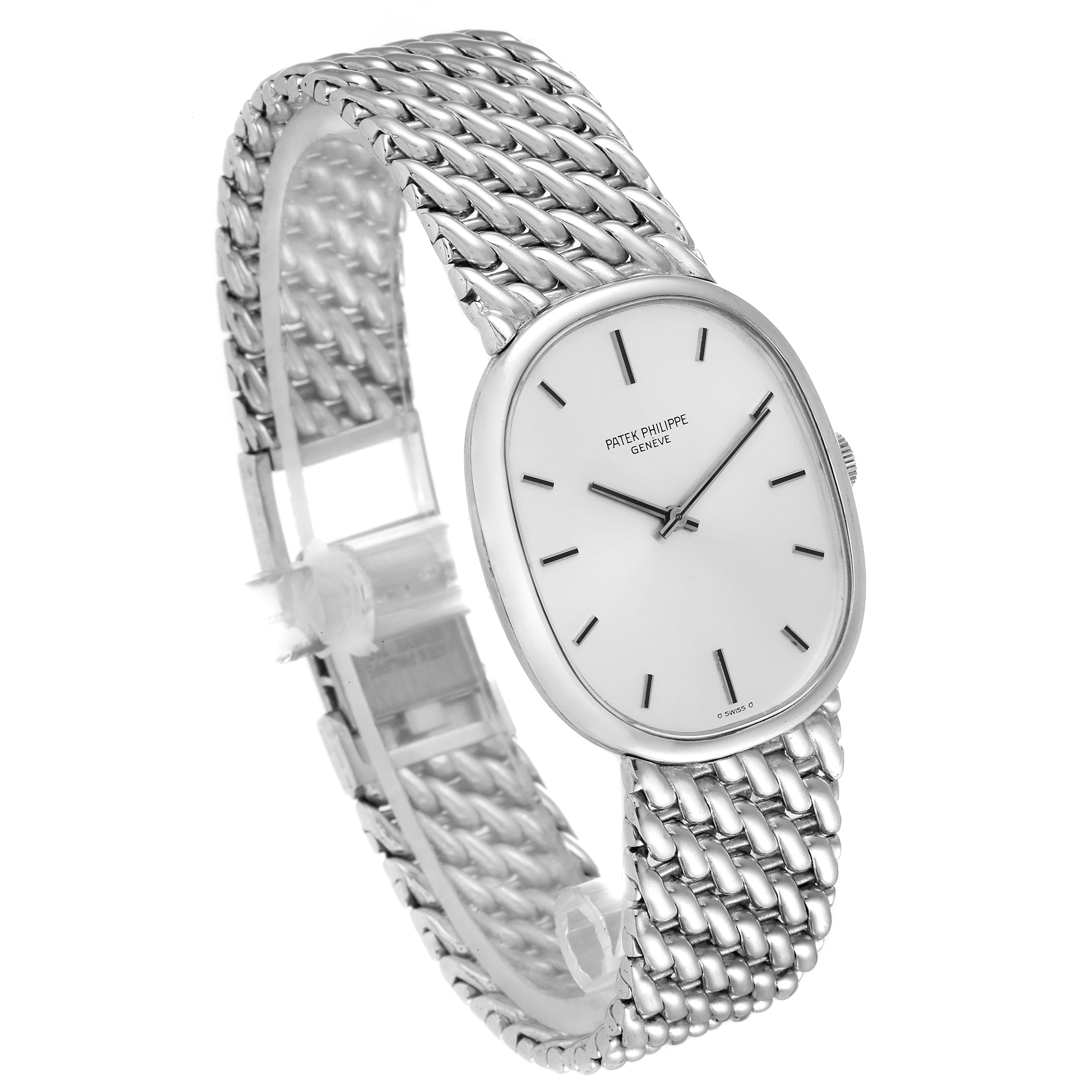 The image shows a side view of the Patek Philippe Golden Ellipse 3848 Men's White Gold Silver Dial 3848 Men's White Gold Silver Dial watch, focusing on its oval dial and metallic woven bracelet.