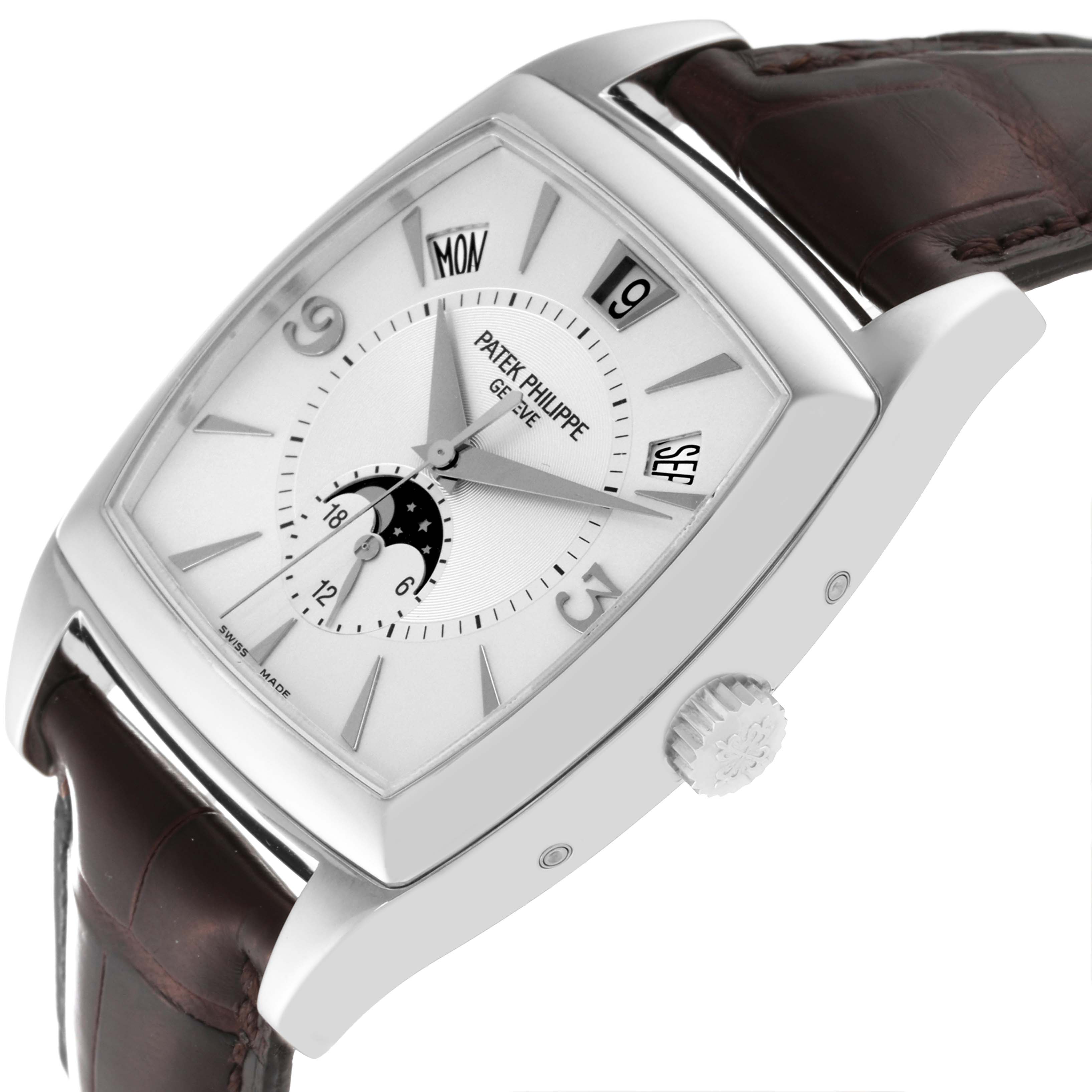 The image shows a Patek Philippe Gondolo 5135G-001 Men's White Gold Silver Dial 5135G-001 Men's White Gold Silver Dial watch from a slight angled view, highlighting the dial, case, crown, and leather strap.