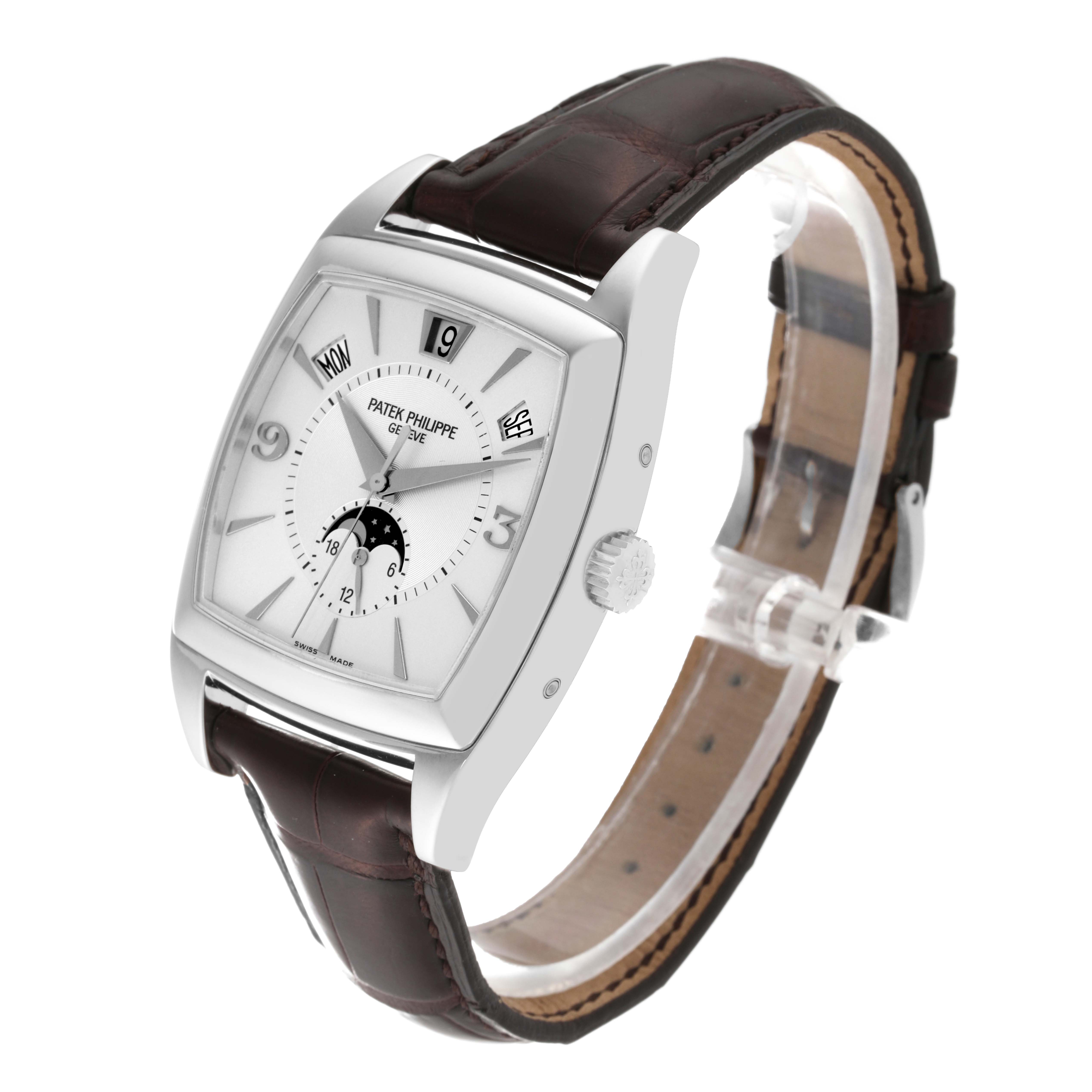 The image shows a front-side angle of the Patek Philippe Gondolo 5135G-001 Men's White Gold Silver Dial 5135G-001 Men's White Gold Silver Dial watch, highlighting its dial, crown, and leather strap.